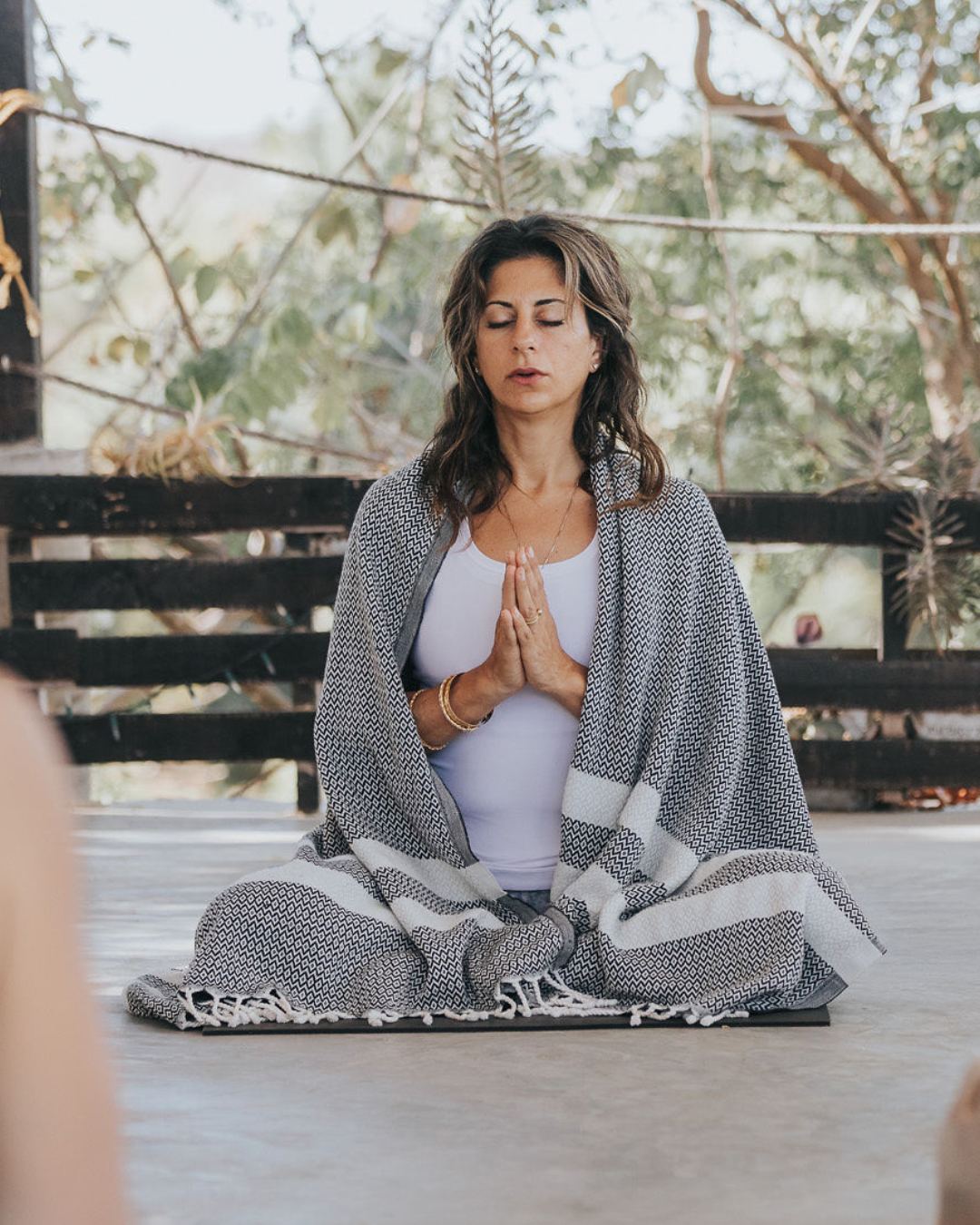 Geometric drawing of an outline square with sections divided by vertical, horizontal, and half circle lines.