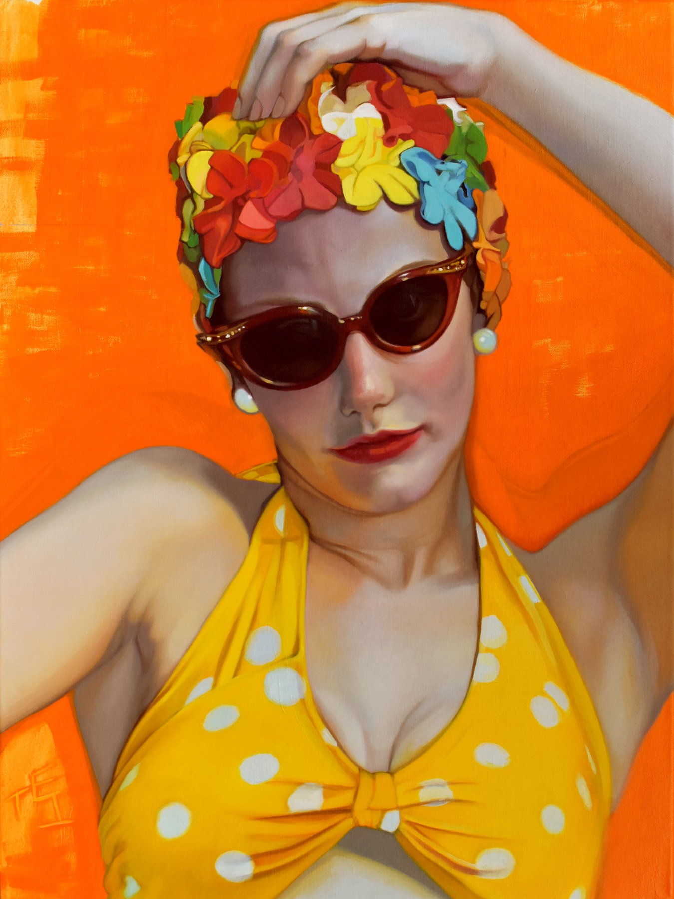 A woman wearing a yellow polka dot halter top, sunglasses, and pearl earrings, relaxing on an orange surface, with a colorful headscarf and makeup.