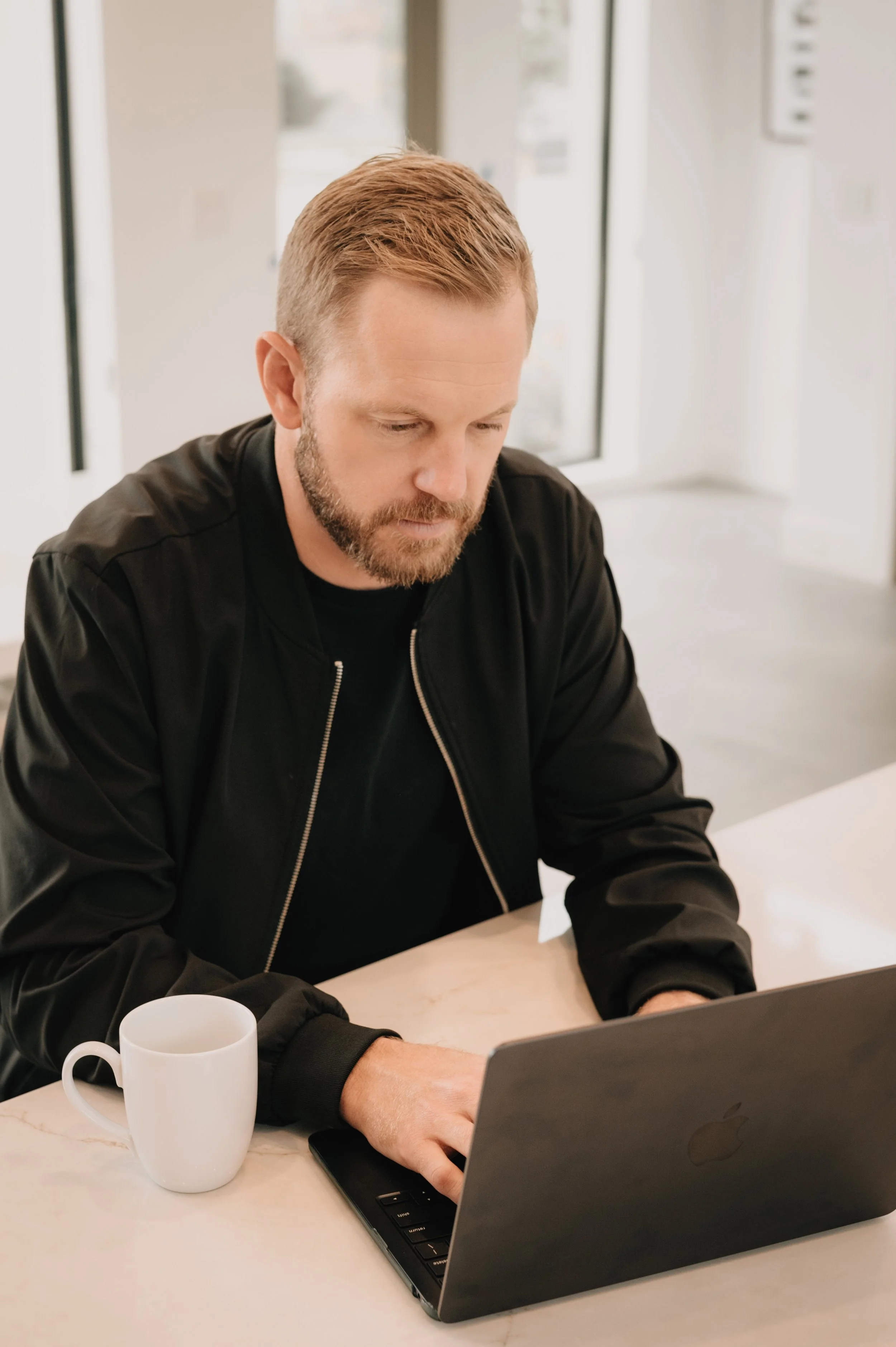 Denver real estate agent reviewing market data before submitting a home offer