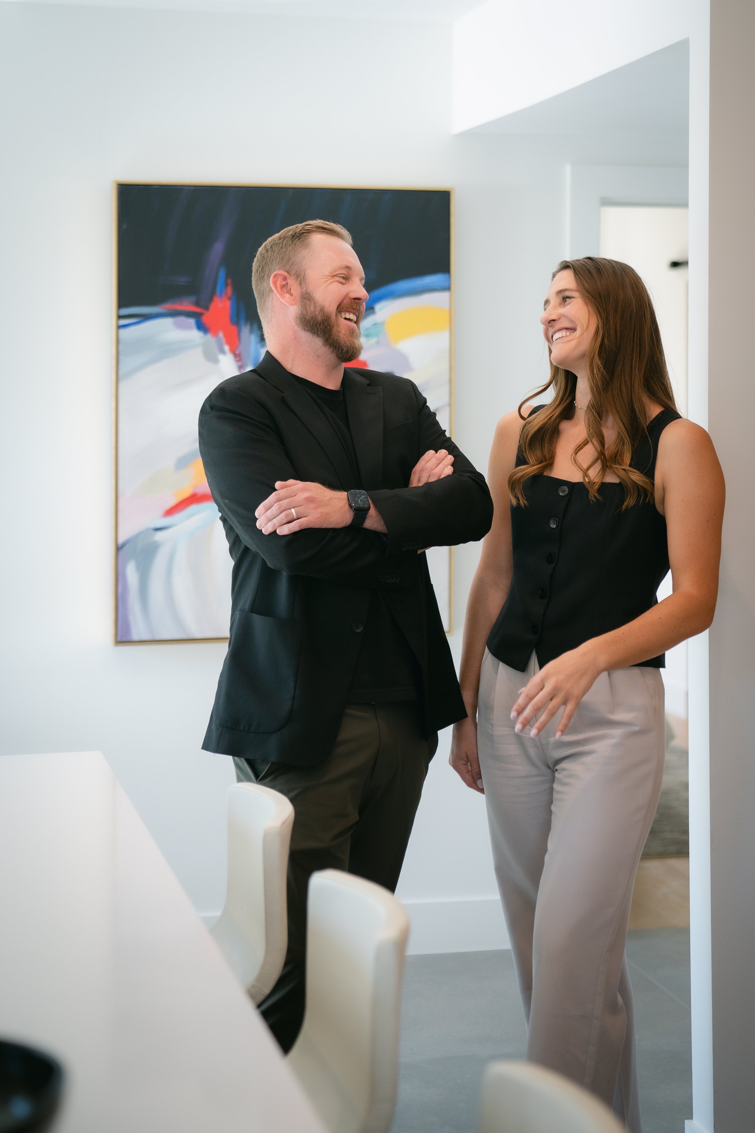 Denver real estate agents meeting with home buyers to discuss goals and neighborhood preferences