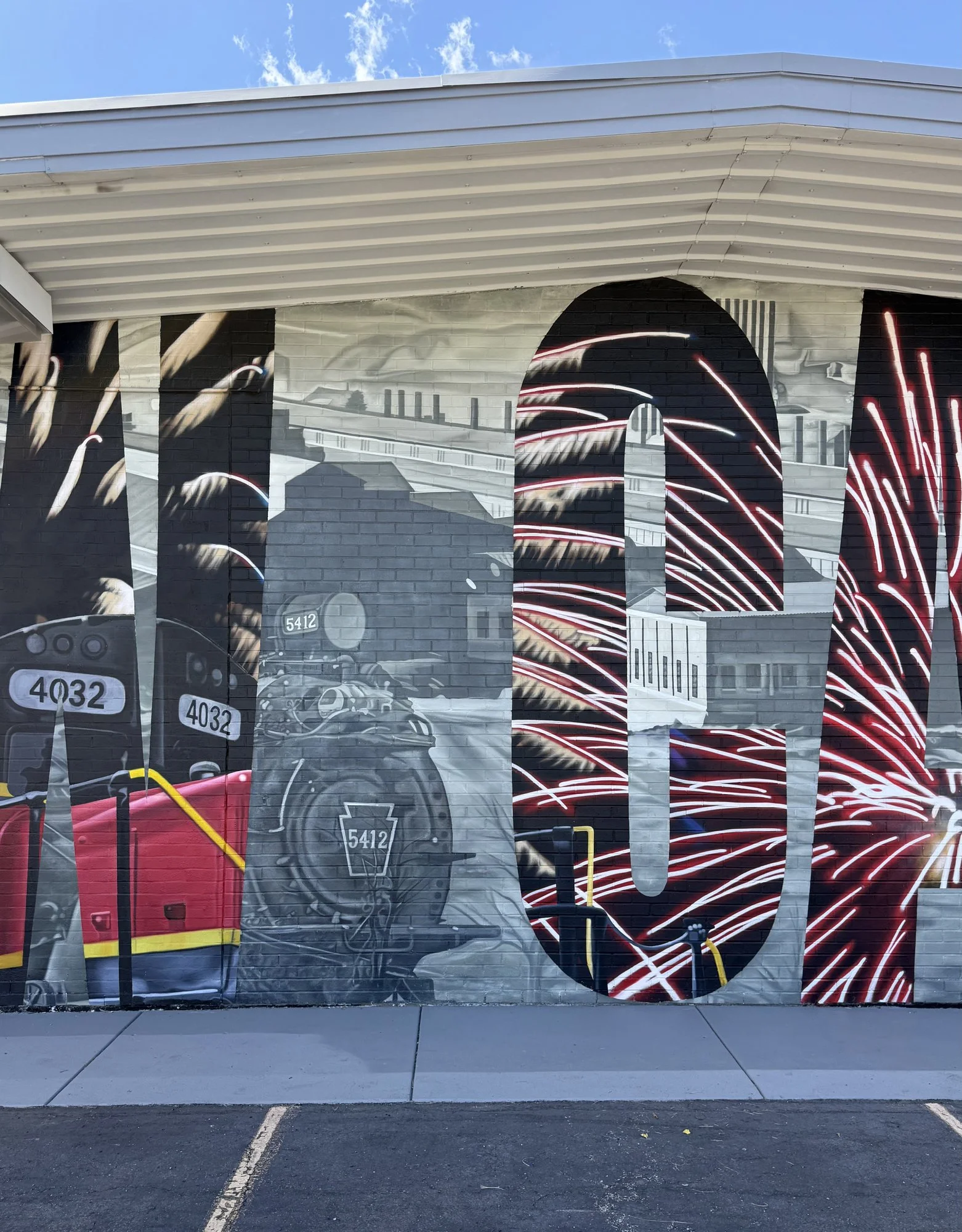 This large-scale mural was designed to captured the identity of New Castle by contrasting its industrial heritage with the city's modern character. Hand-painted across a 50' x 18' wall using acrylic, oil, and spray paint.