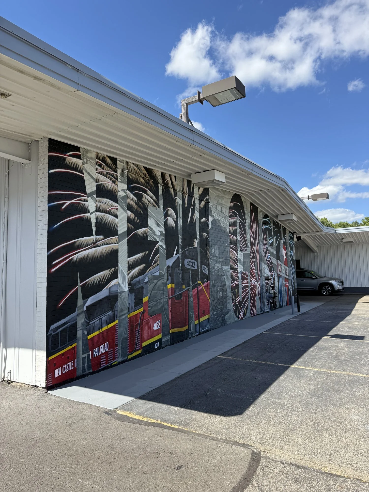 This large-scale mural was designed to captured the identity of New Castle by contrasting its industrial heritage with the city's modern character. Hand-painted across a 50' x 18' wall using acrylic, oil, and spray paint.