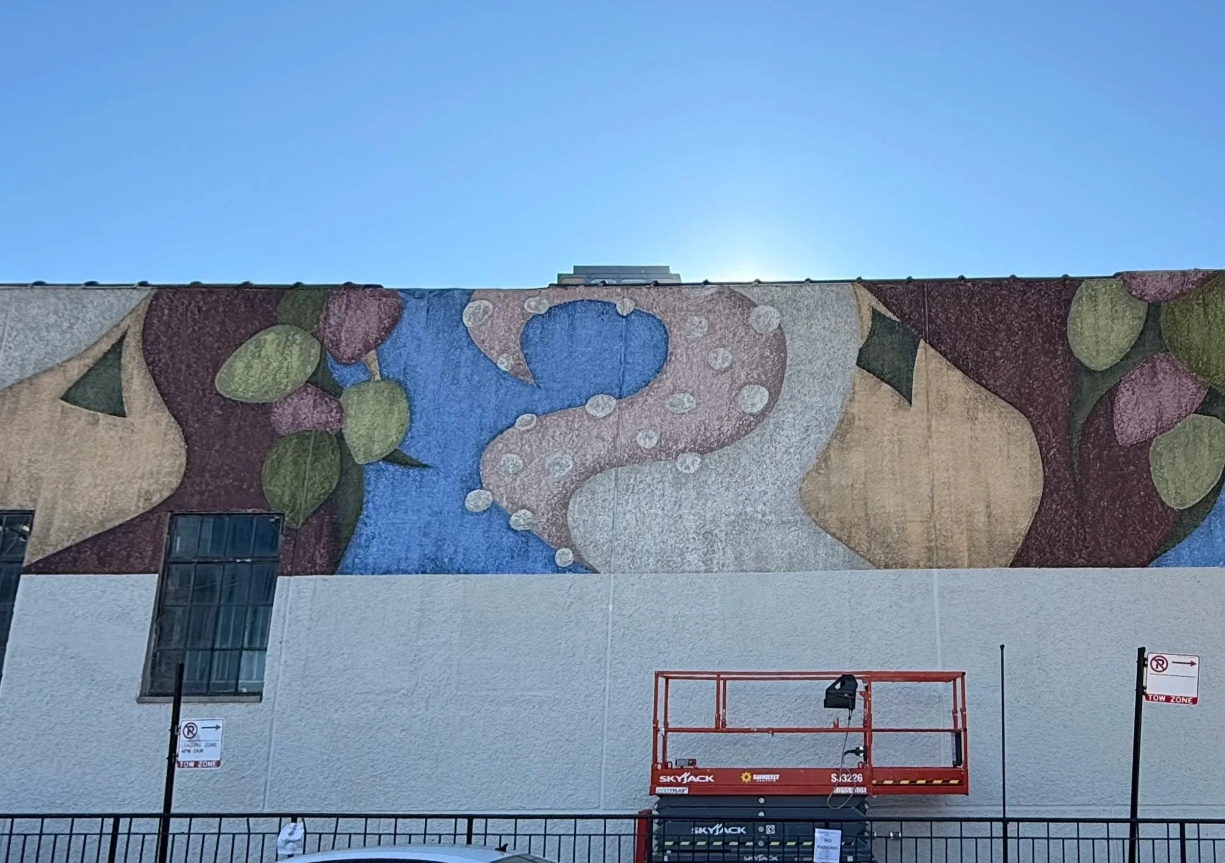 1,100 sq ft exterior mural commissioned by SPB Hospitality for Amada, Iron Chef José Garces' second restaurant location. The work features a distressed, abstract composition inspired by the Andalusian regions of Spain.