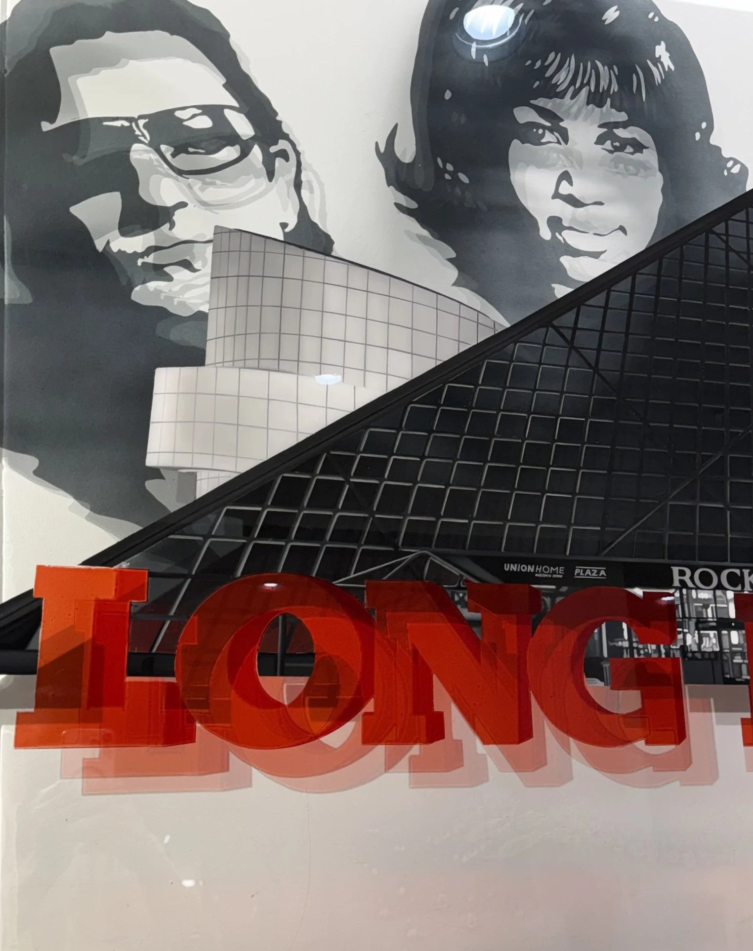 Rock & Roll Hall of Fame inspired installation featuring hand-painted building elements & layered stained glass on 4ft x 6ft tempered glass. Finished with epoxy resin & mounted using standoff mounting. Over 200 hours in creation.