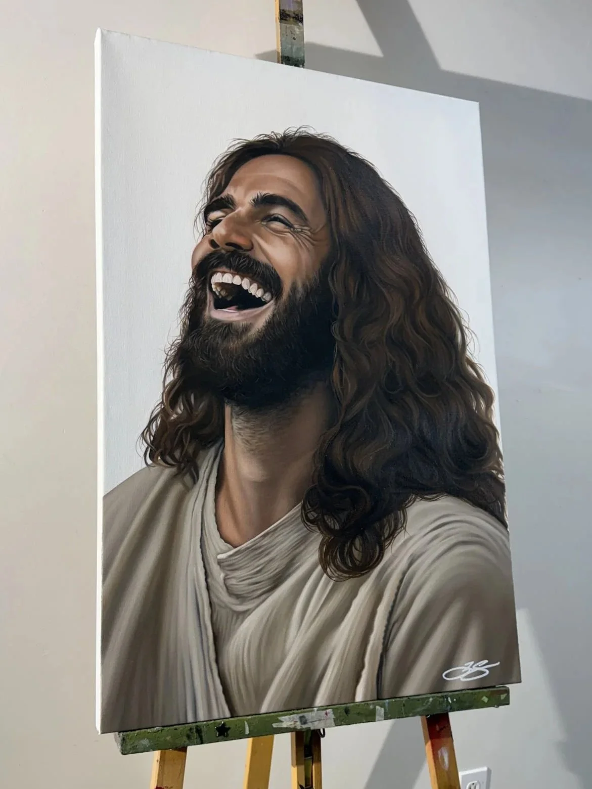 Oil painting of Jesus laughing on 24" x 36" canvas