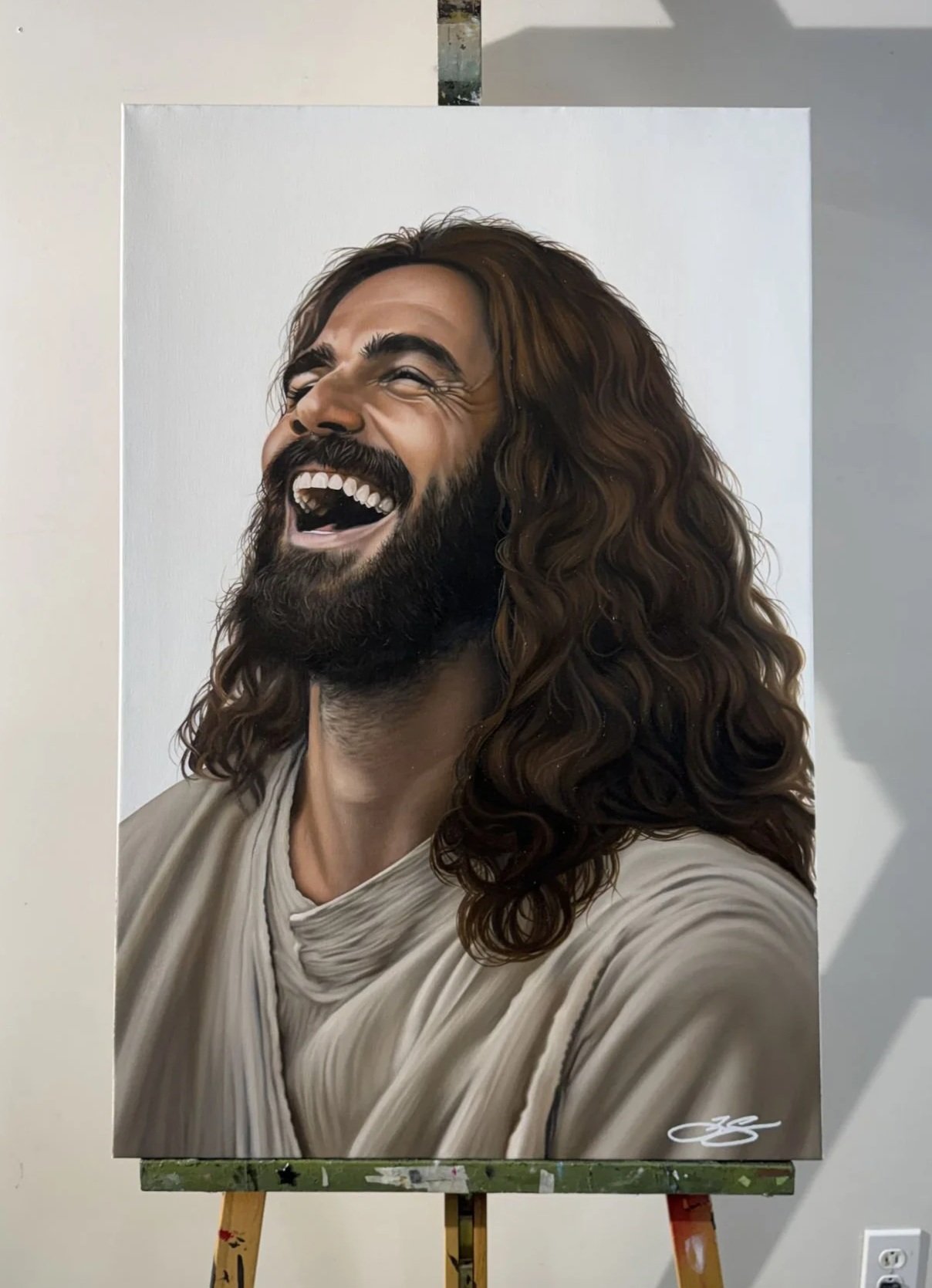 Oil painting of Jesus laughing on 24" x 36" canvas