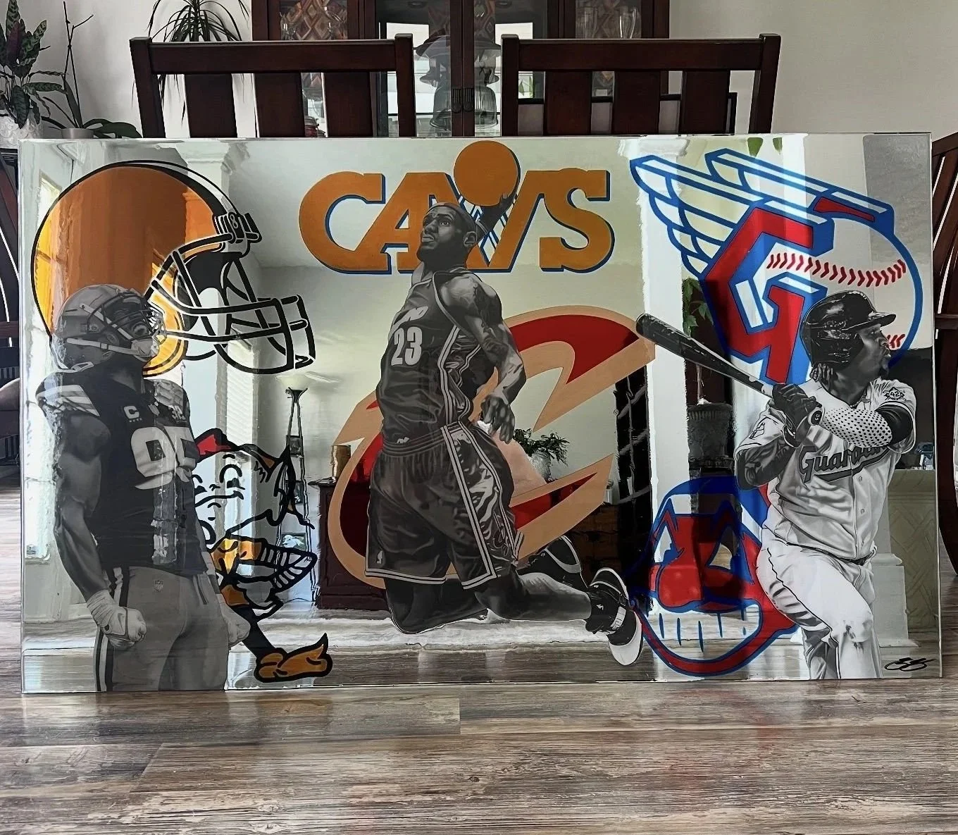 Custom mixed-media mirror artwork created for a private collector. The piece features graphite realism drawings, stained-glass painted mirror elements and epoxy resin on a 3ft x 5ft mirror.