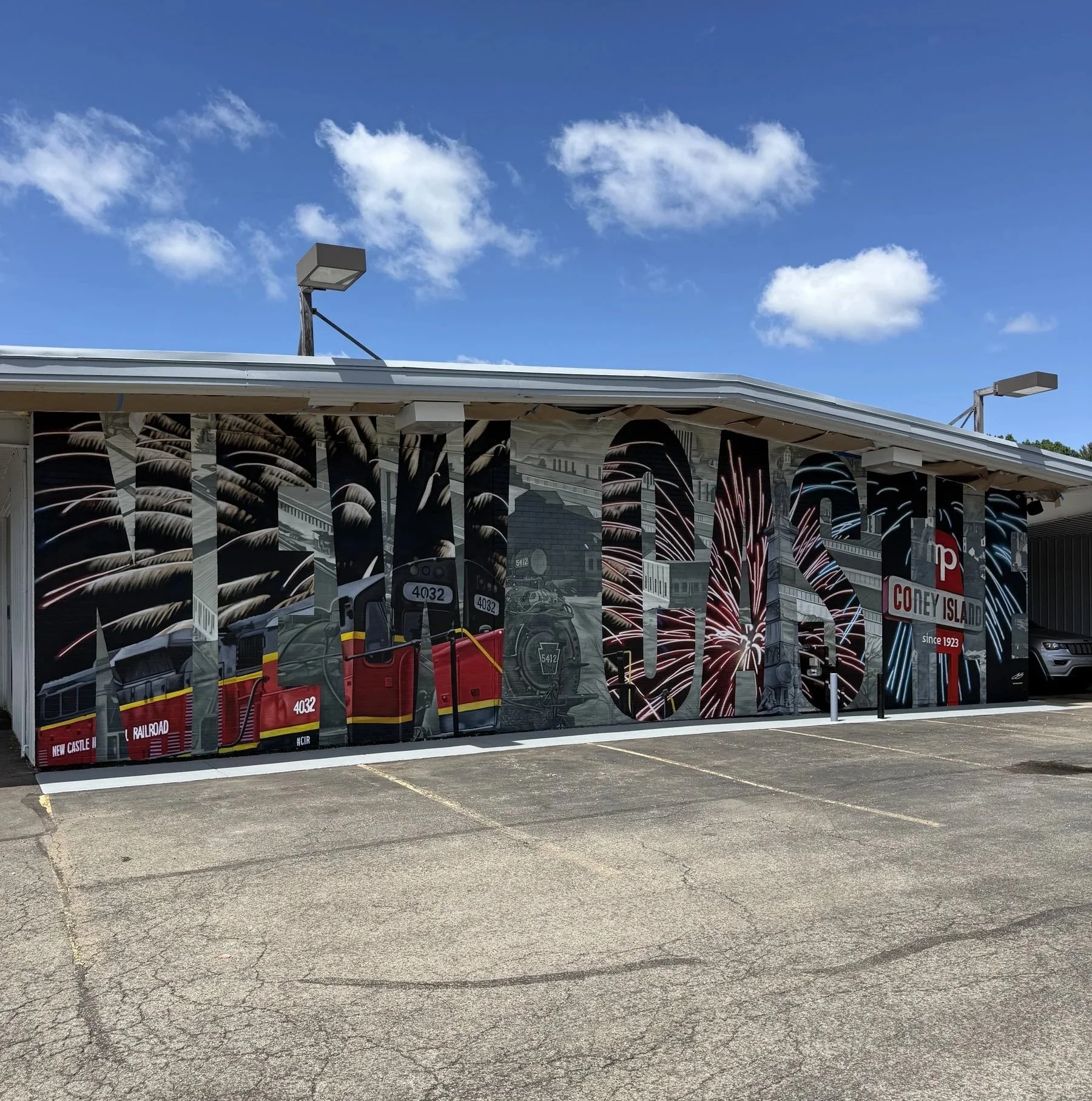 This large-scale mural was designed to captured the identity of New Castle by contrasting its industrial heritage with the city's modern character. Hand-painted across a 50' x 18' wall using acrylic, oil, and spray paint.