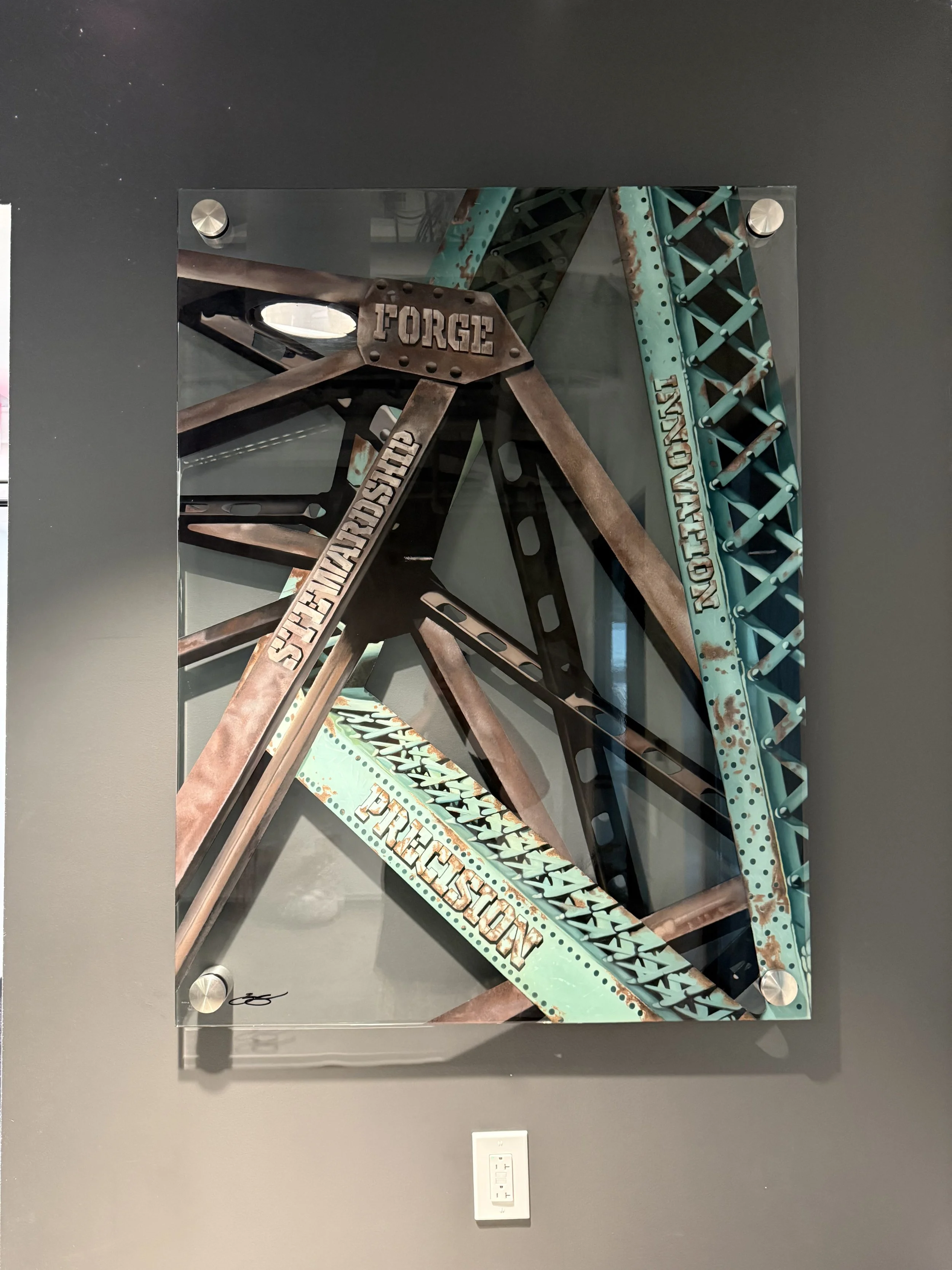 Cleveland steel industry inspired glass installation featuring industrial bridge structures painted on 3ft x 4ft tempered glass. Finished with epoxy resin and floating stainless steel standoff mounting. Approximately 150 hours in creation.