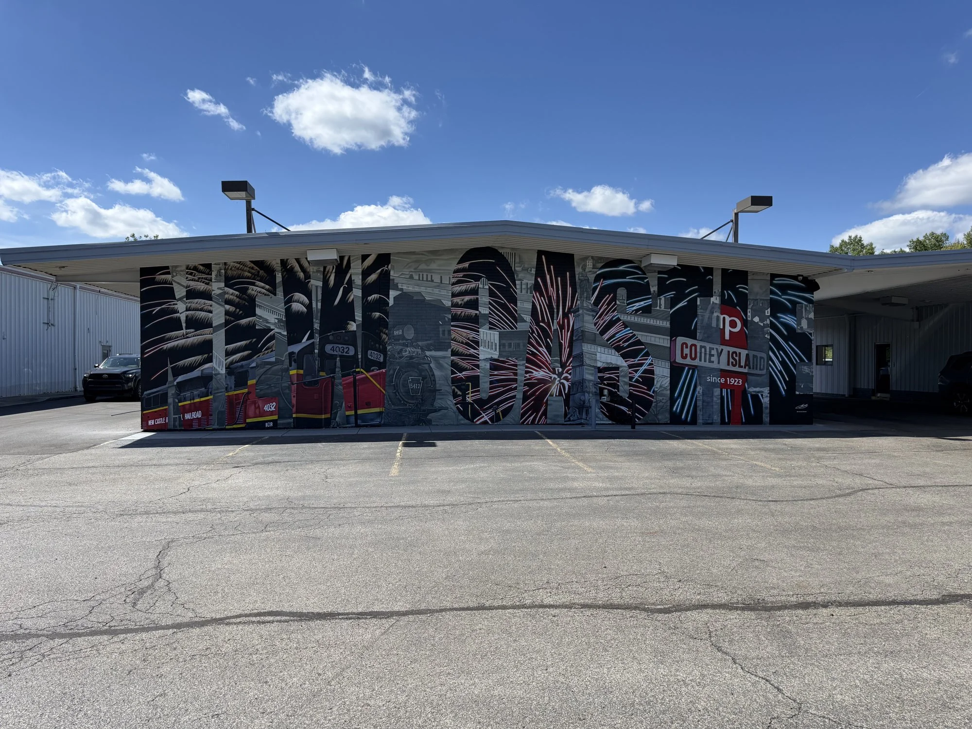 This large-scale mural was designed to captured the identity of New Castle by contrasting its industrial heritage with the city's modern character. Hand-painted across a 50' x 18' wall using acrylic, oil, and spray paint.