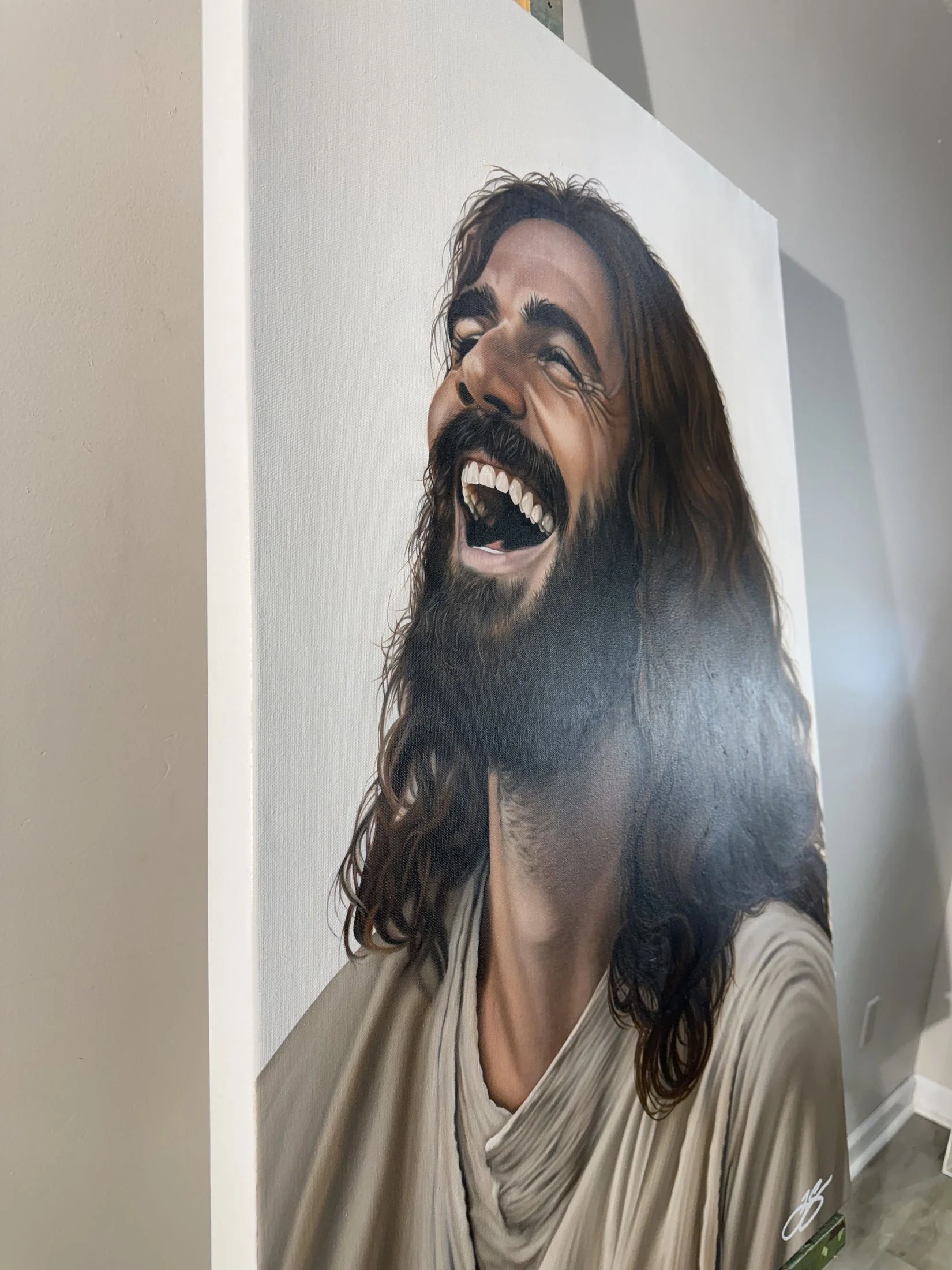 Oil painting of Jesus laughing on 24" x 36" canvas