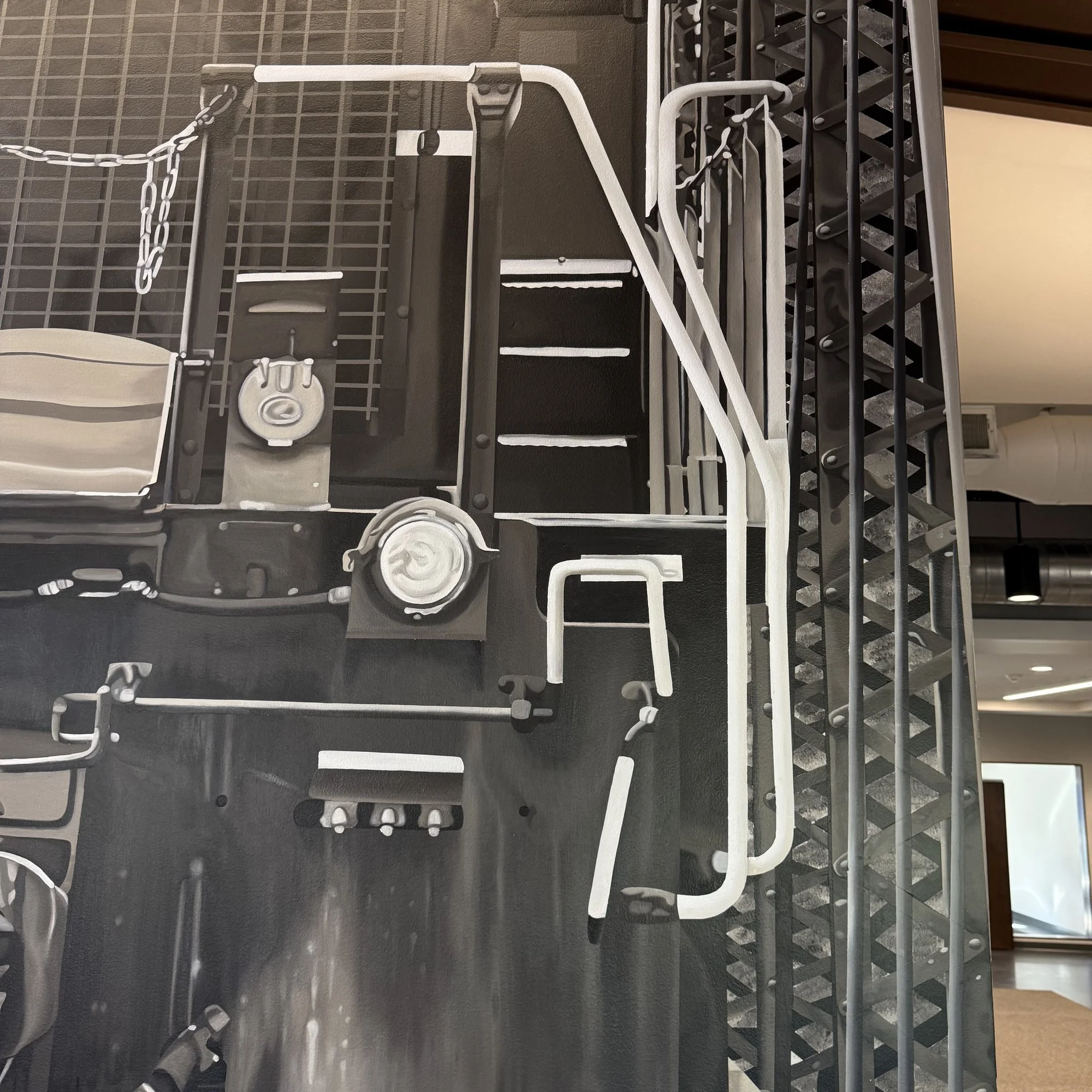 This 19' x 9' hyperrealistic mural was hand-painted in acrylic for New Castle Industrial Railroad, accompanied by the historic logos of its connecting railroads to honor the region's rich railroad heritage.