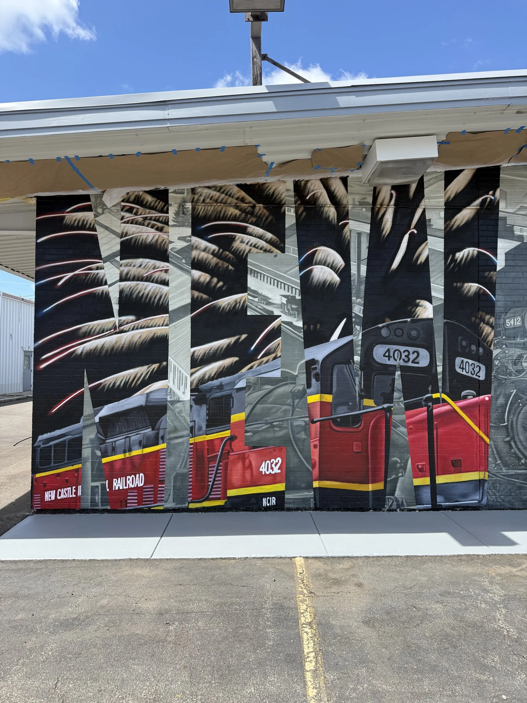 This large-scale mural was designed to captured the identity of New Castle by contrasting its industrial heritage with the city's modern character. Hand-painted across a 50' x 18' wall using acrylic, oil, and spray paint.