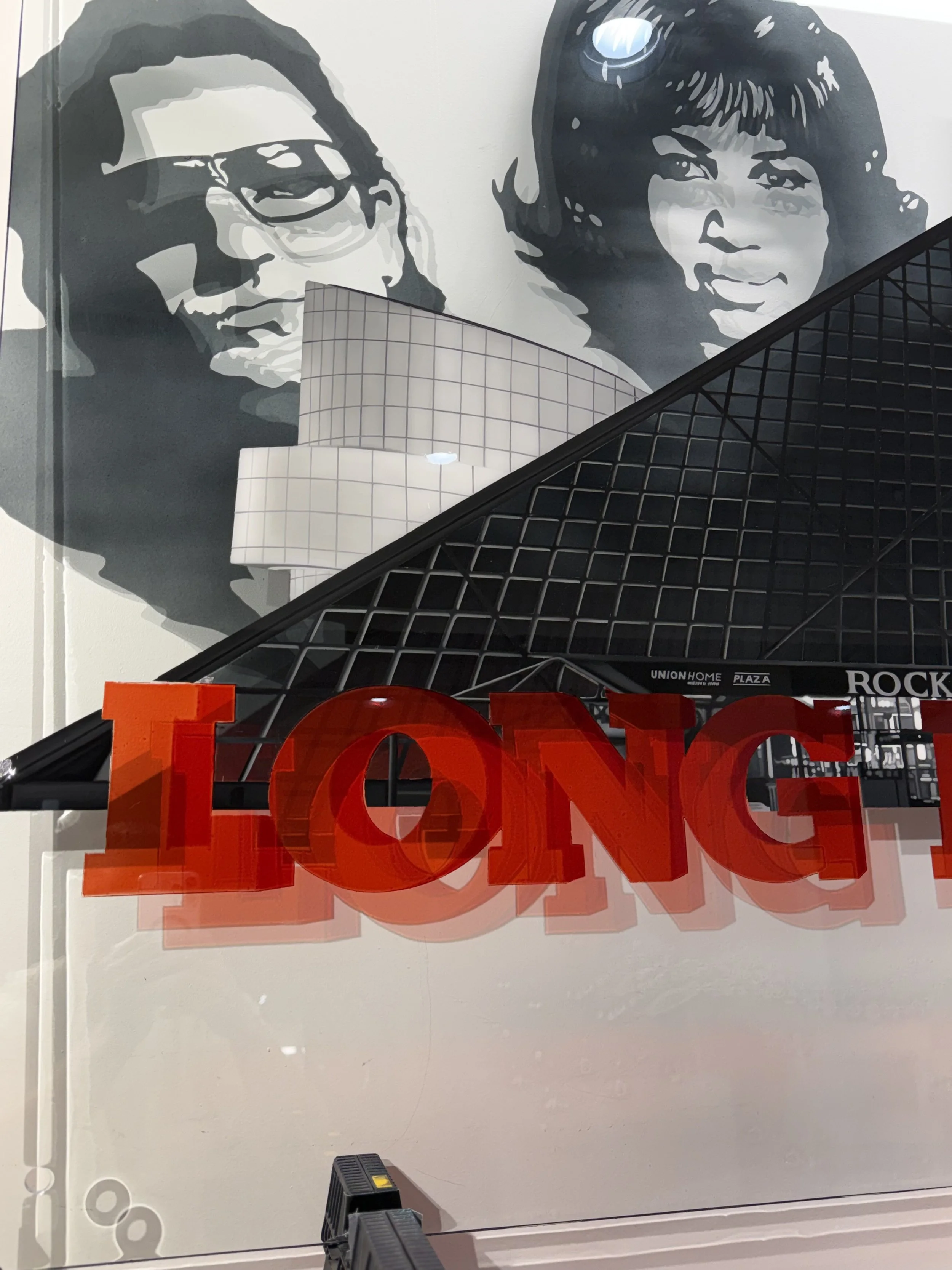 Rock & Roll Hall of Fame inspired glass installation created with oil paint, layered stained glass techniques and epoxy resin on 4ft x 6ft tempered glass. Installed using floating stainless steel standoffs. Over 200 hours in creation.