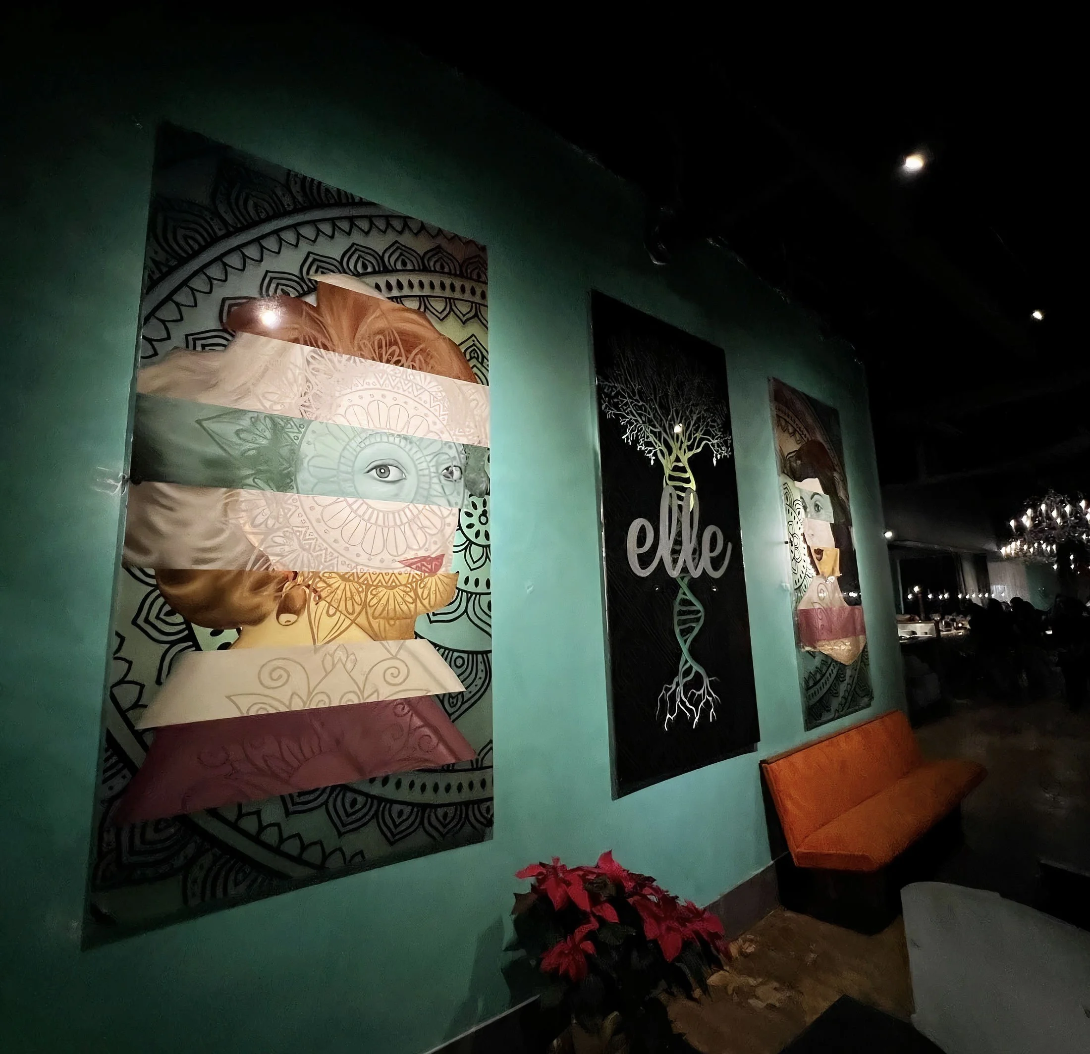 Designed in response to the restaurant's Mediterranean identity, the three-panel plexiglass installation incorporates oil, acrylic, stained glass paint and resin with LED backlighting to create a cohesive, immersive focal point.