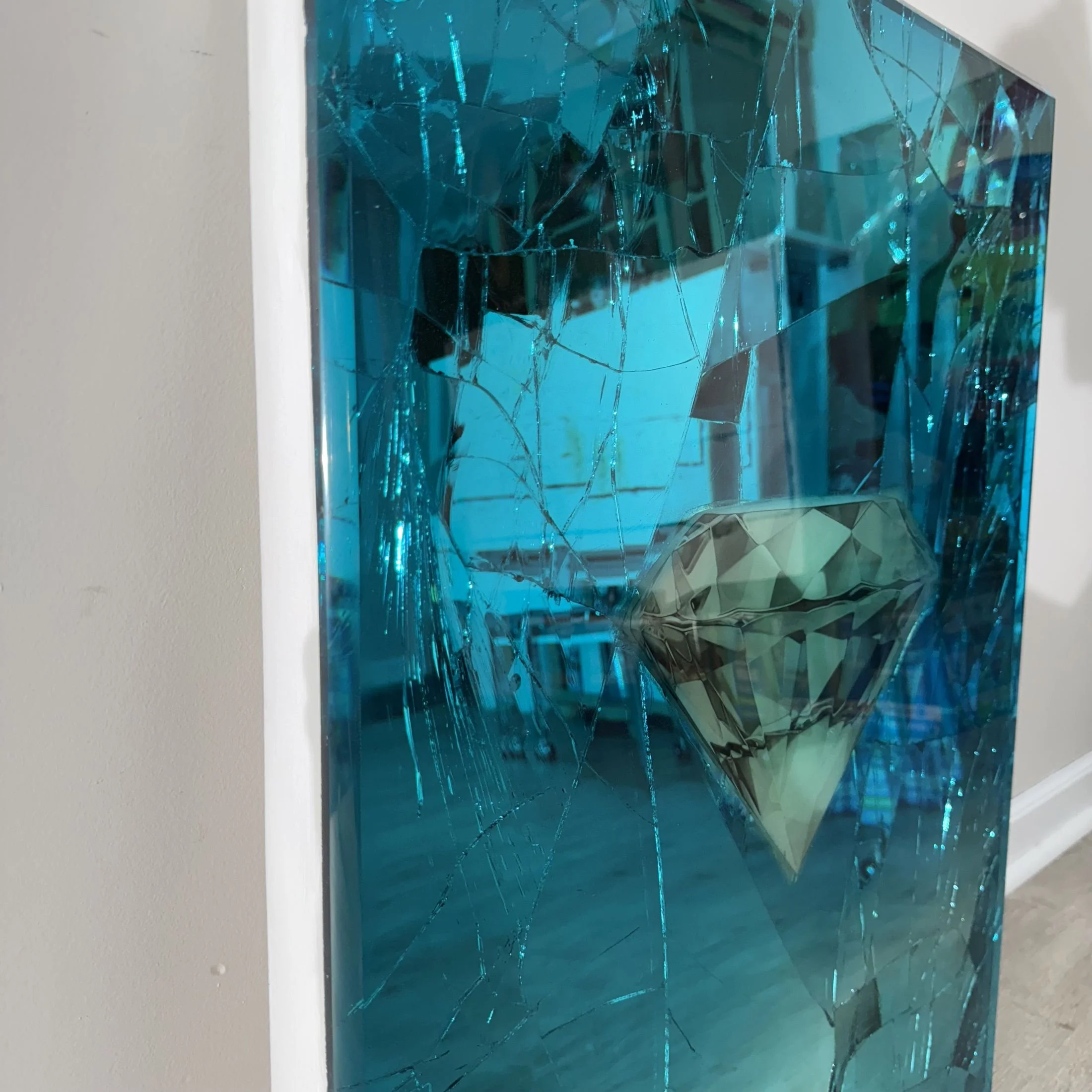 Graphite pencil drawing layered over intentionally shattered mirror and sealed with blue-dyed epoxy resin. Mounted to canvas. 24 x 30 in.