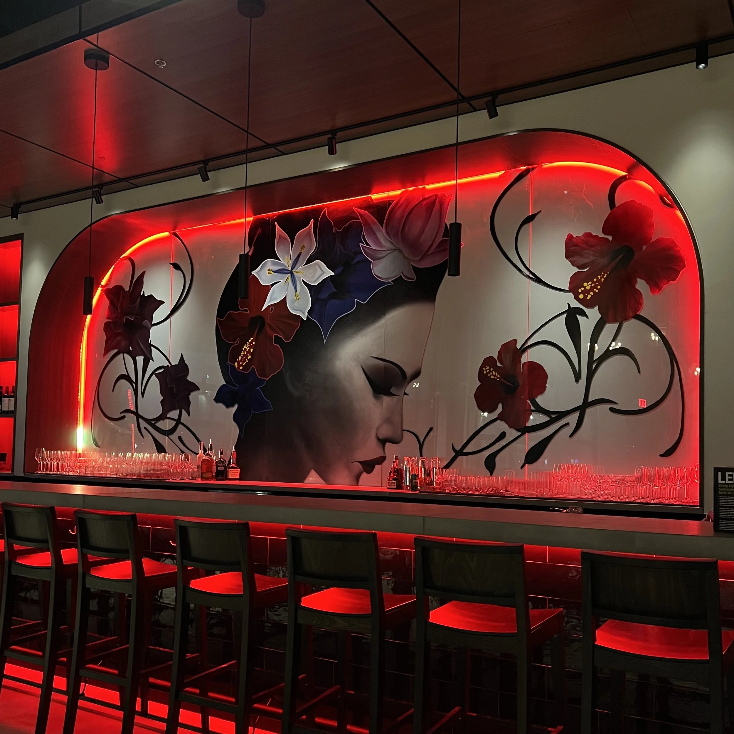 Multi-Space Installation featuring custom murals, large-scale plexiglass artworks and resin-coated oil paintings. The project integrated spray paint, acrylic, oil, gold leaf and resin across dining bars, private spaces and restrooms.