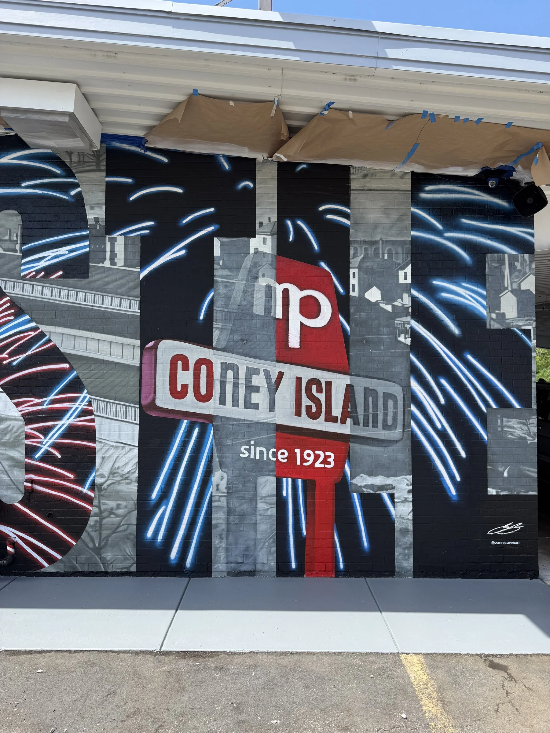 This large-scale mural was designed to captured the identity of New Castle by contrasting its industrial heritage with the city's modern character. Hand-painted across a 50' x 18' wall using acrylic, oil, and spray paint.