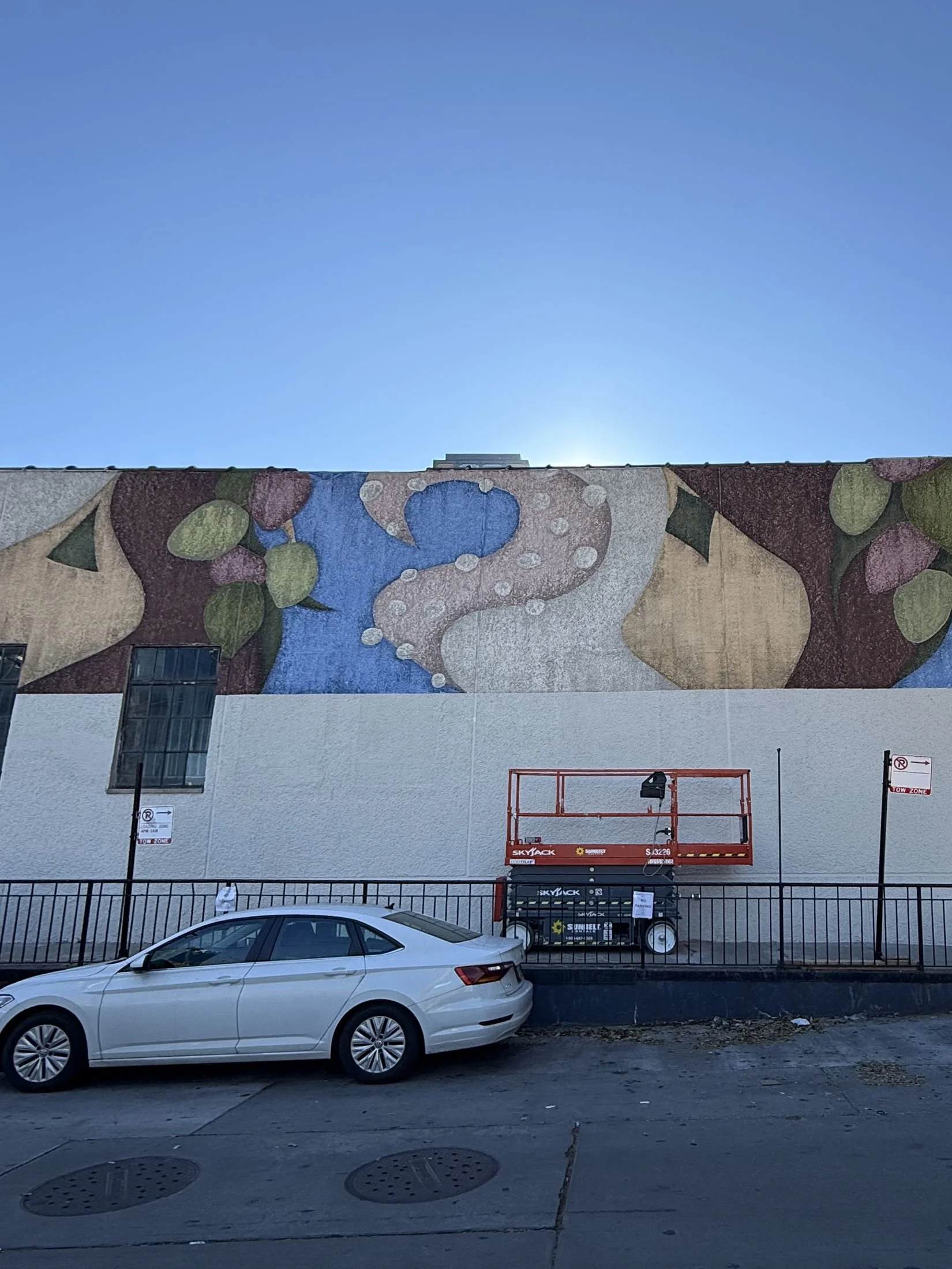 1,100 sq ft exterior mural commissioned by SPB Hospitality for Amada, Iron Chef José Garces' second restaurant location. The work features a distressed, abstract composition inspired by the Andalusian regions of Spain.