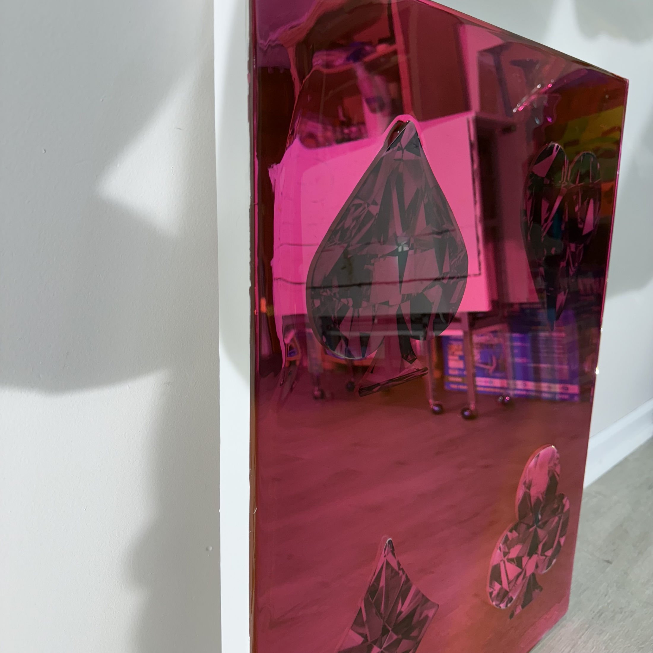 Graphite pencil drawings layered over mirror and sealed with pink-dyed epoxy resin. Mounted to canvas. 24 x 30 in.
