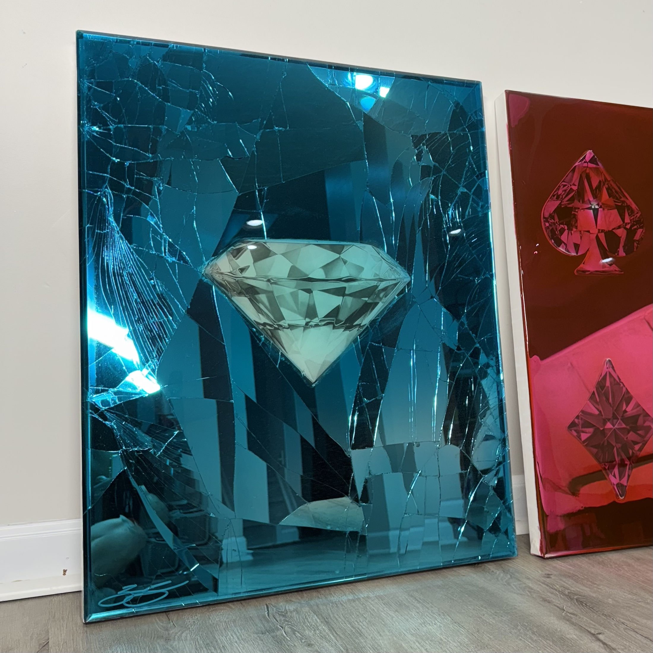 Graphite pencil drawing layered over intentionally shattered mirror and sealed with blue-dyed epoxy resin. Mounted to canvas. 24 x 30 in.