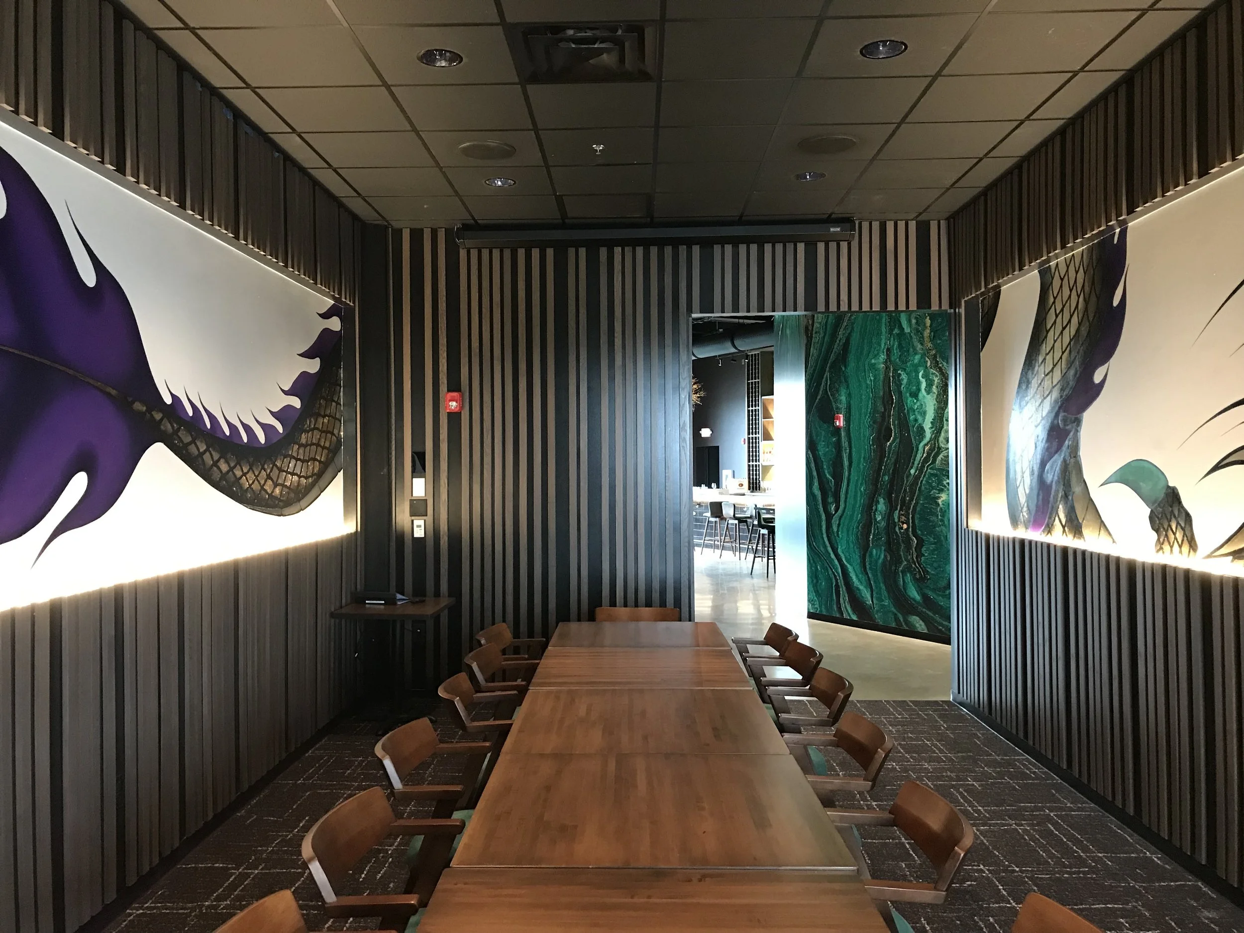 Multi-Space Installation featuring custom murals, large-scale plexiglass artworks and resin-coated oil paintings. The project integrated spray paint, acrylic, oil, gold leaf and resin across dining bars, private spaces and restrooms.