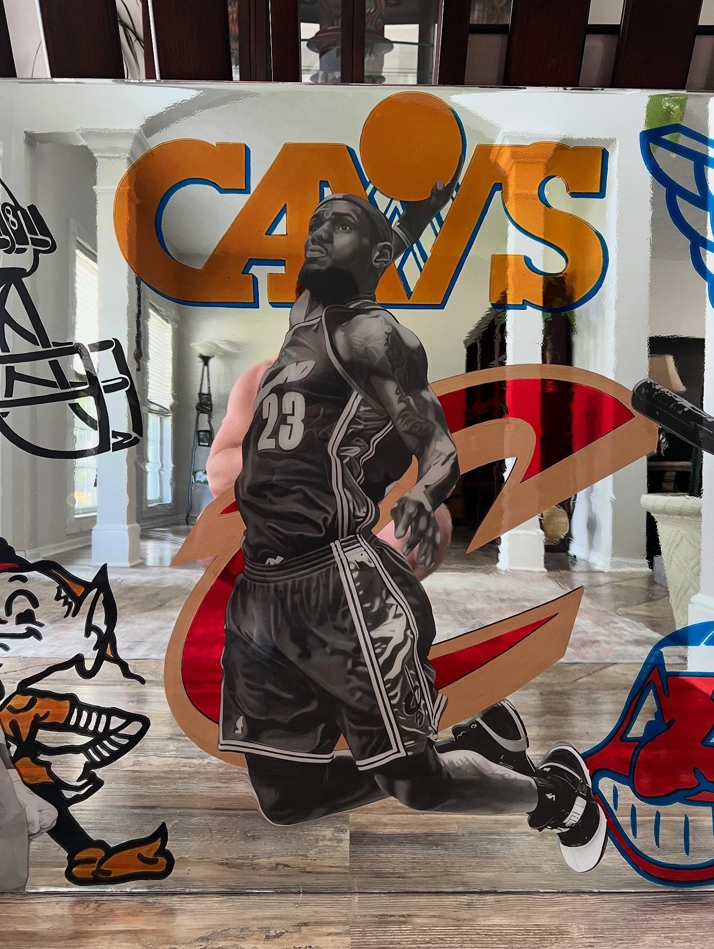 Custom mixed-media mirror artwork created for a private collector. The piece features graphite realism drawings, stained-glass painted mirror elements and epoxy resin on a 3ft x 5ft mirror.