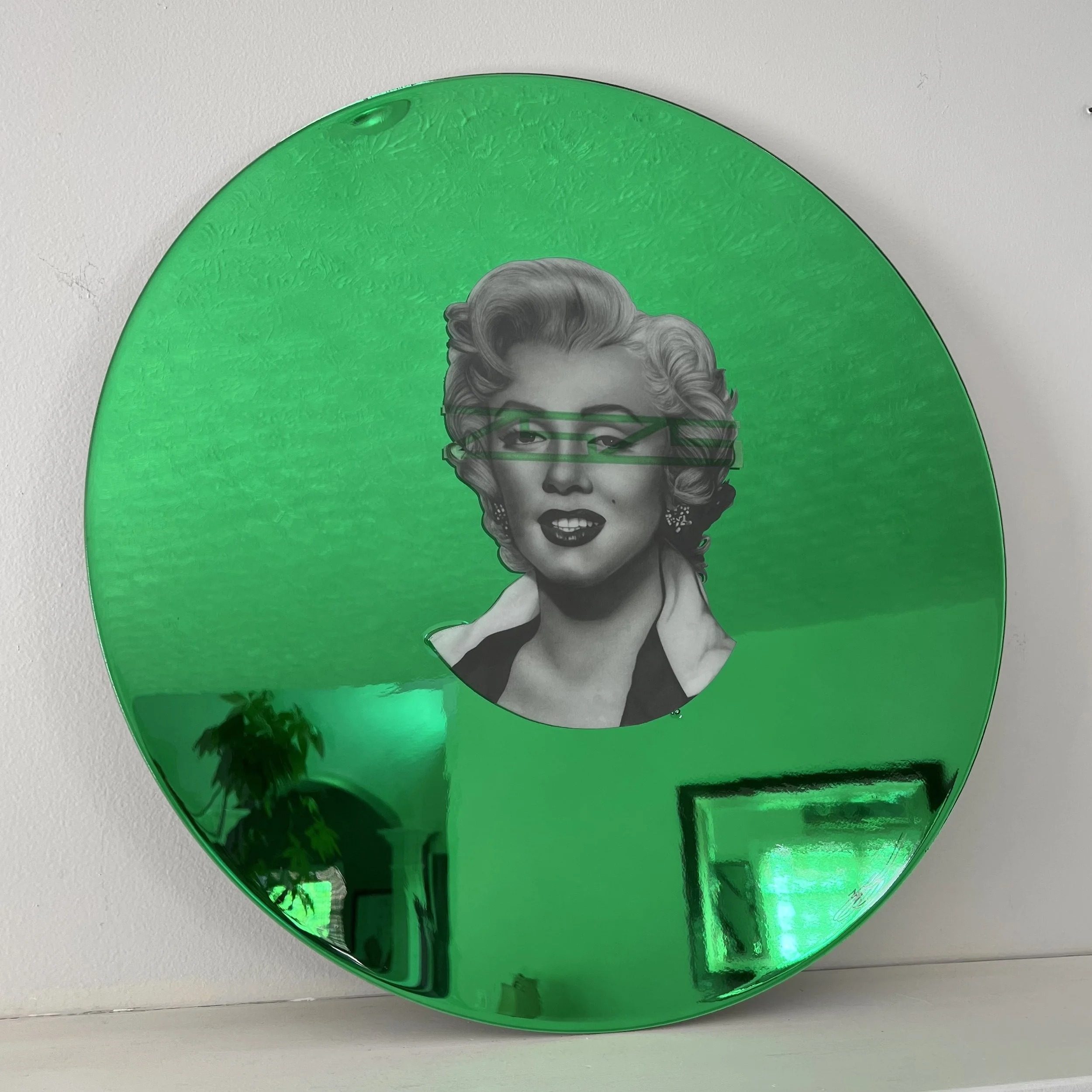Graphite pencil portrait, layered over stained glass painted mirror. Sealed with epoxy resin. 24 in. diameter.