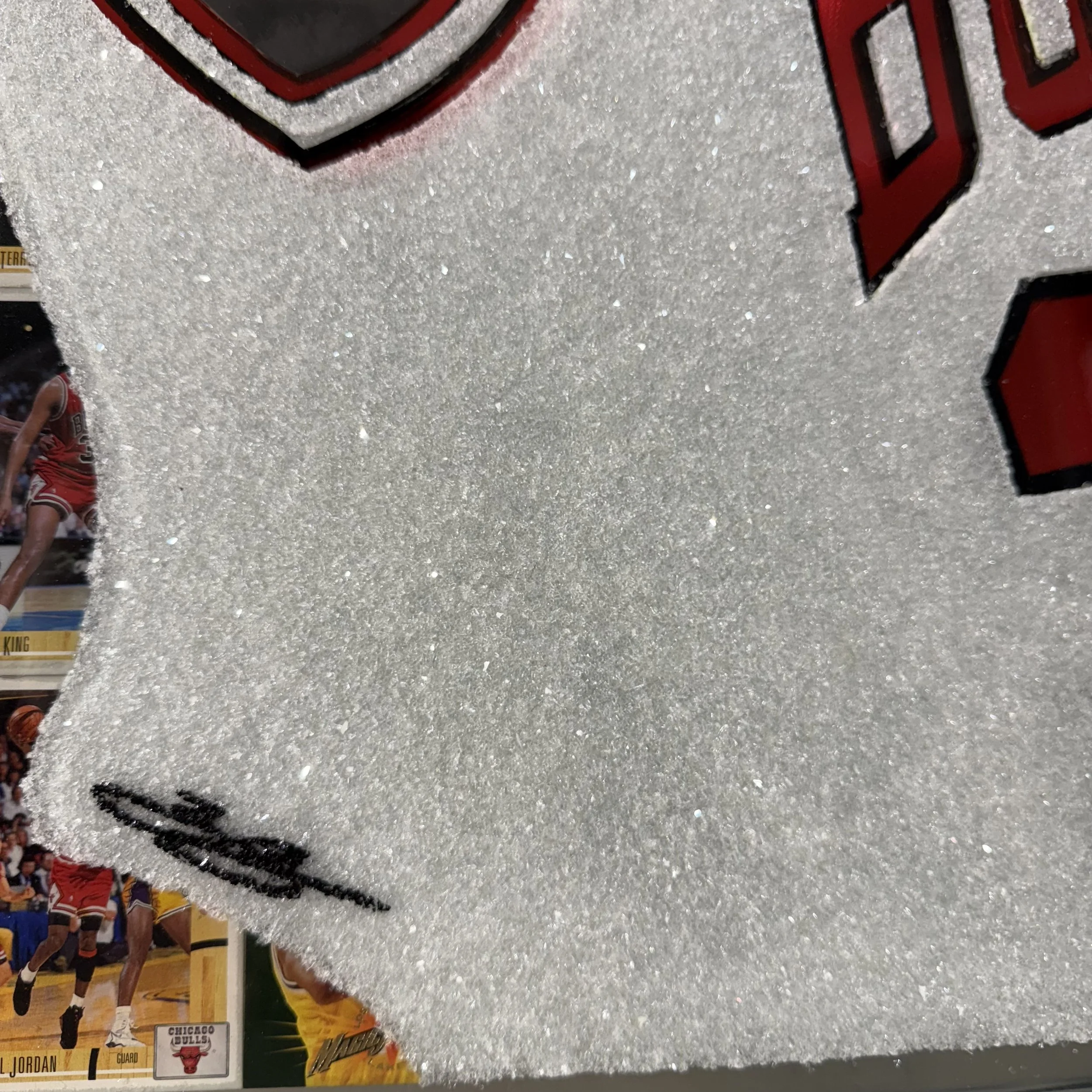 Graphite portrait layered over original NBA trading cards from Michael Jordan's active years. Stained glass paint, ink, resin and diamond dust on mirror. Mounted to canvas. 24 x 36 in.