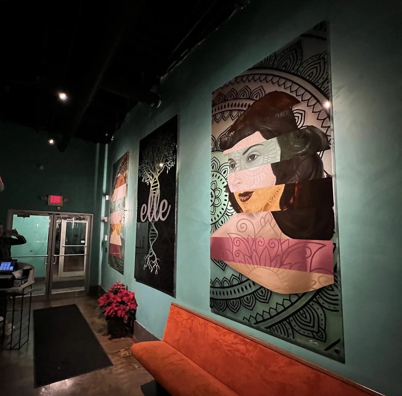 Designed in response to the restaurant's Mediterranean identity, the three-panel plexiglass installation incorporates oil, acrylic, stained glass paint and resin with LED backlighting to create a cohesive, immersive focal point.