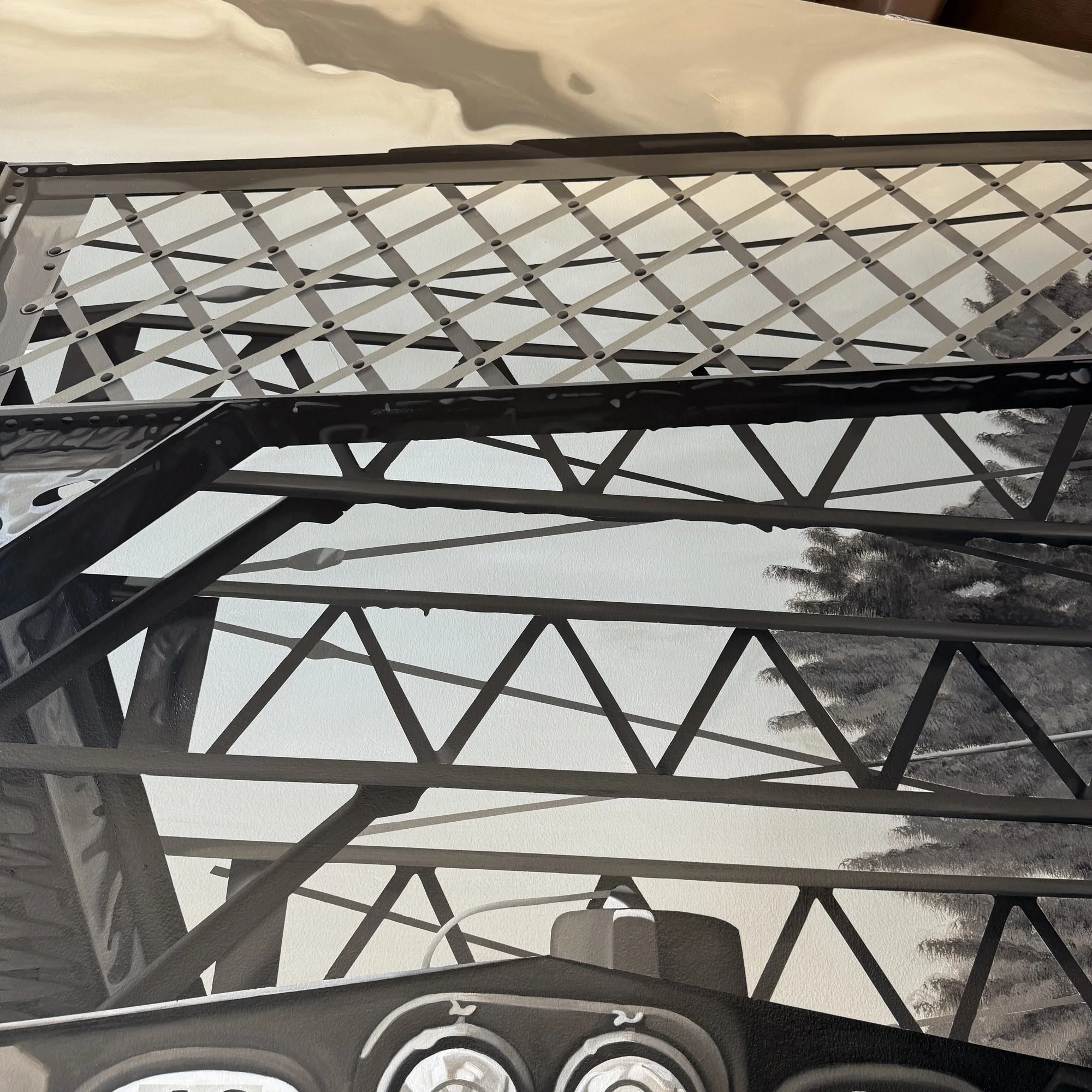 This 19' x 9' hyperrealistic mural was hand-painted in acrylic for New Castle Industrial Railroad, accompanied by the historic logos of its connecting railroads to honor the region's rich railroad heritage.