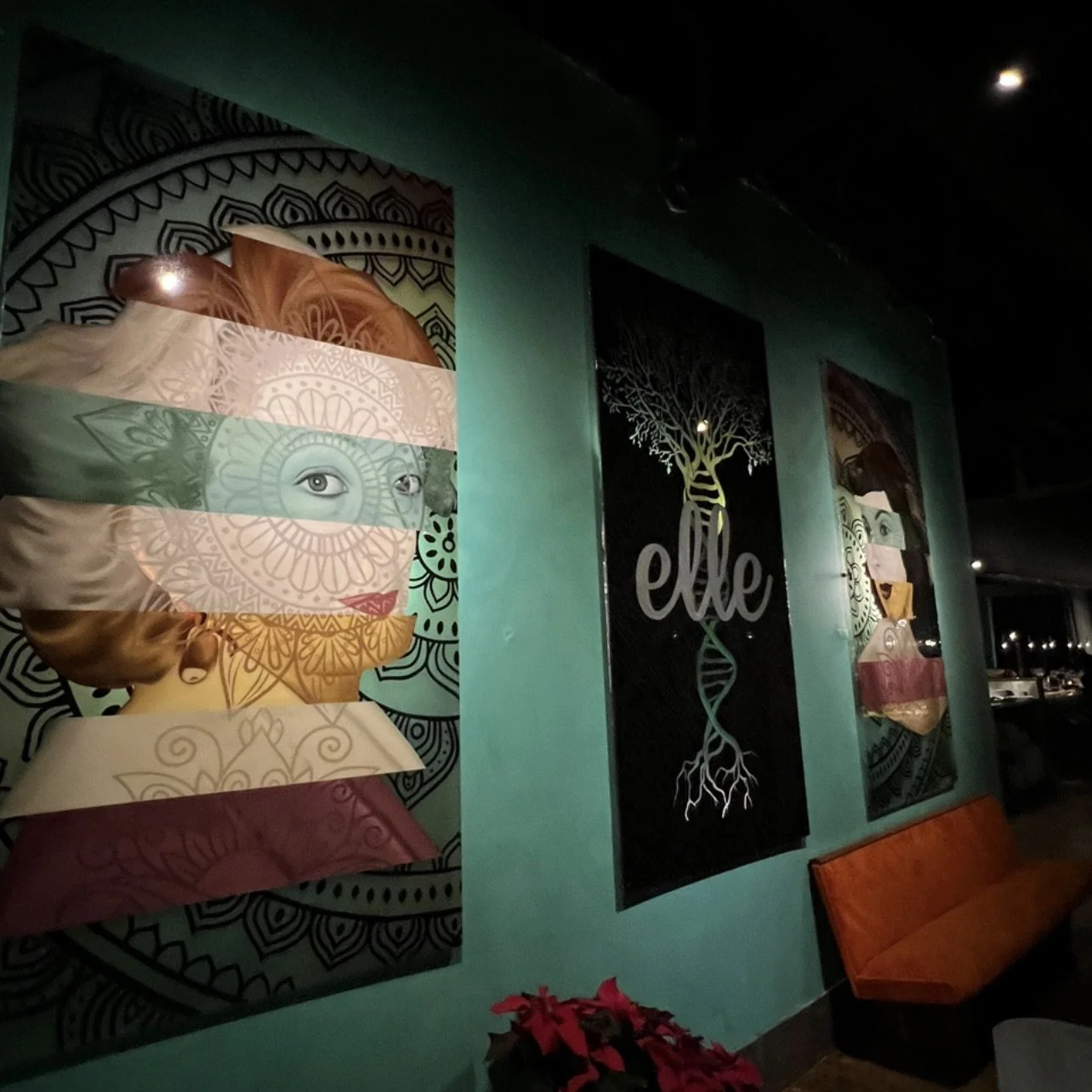 Designed in response to the restaurant's Mediterranean identity, the three-panel plexiglass installation incorporates oil, acrylic, stained glass paint and resin with LED backlighting to create a cohesive, immersive focal point.