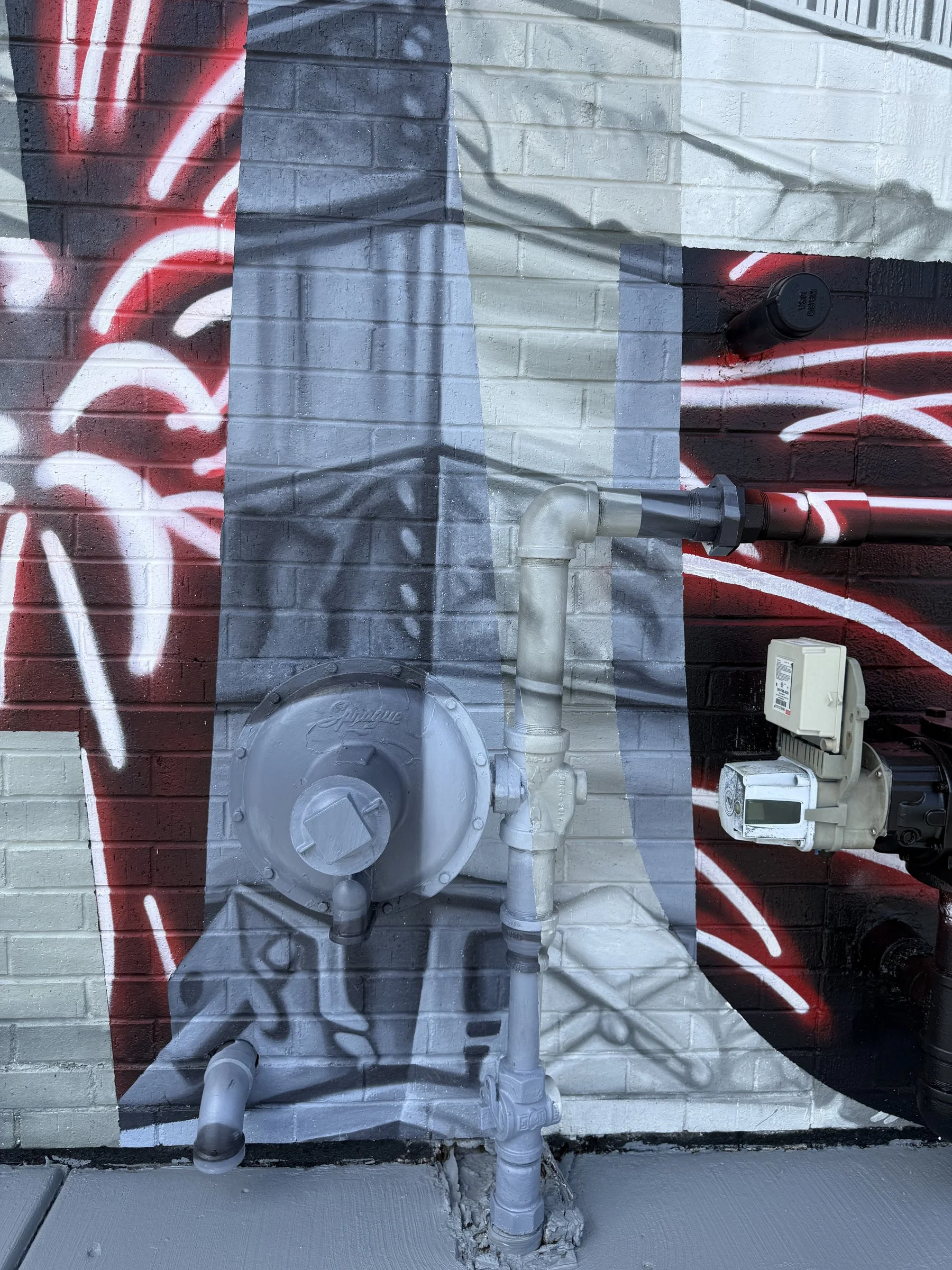 This large-scale mural was designed to captured the identity of New Castle by contrasting its industrial heritage with the city's modern character. Hand-painted across a 50' x 18' wall using acrylic, oil, and spray paint.