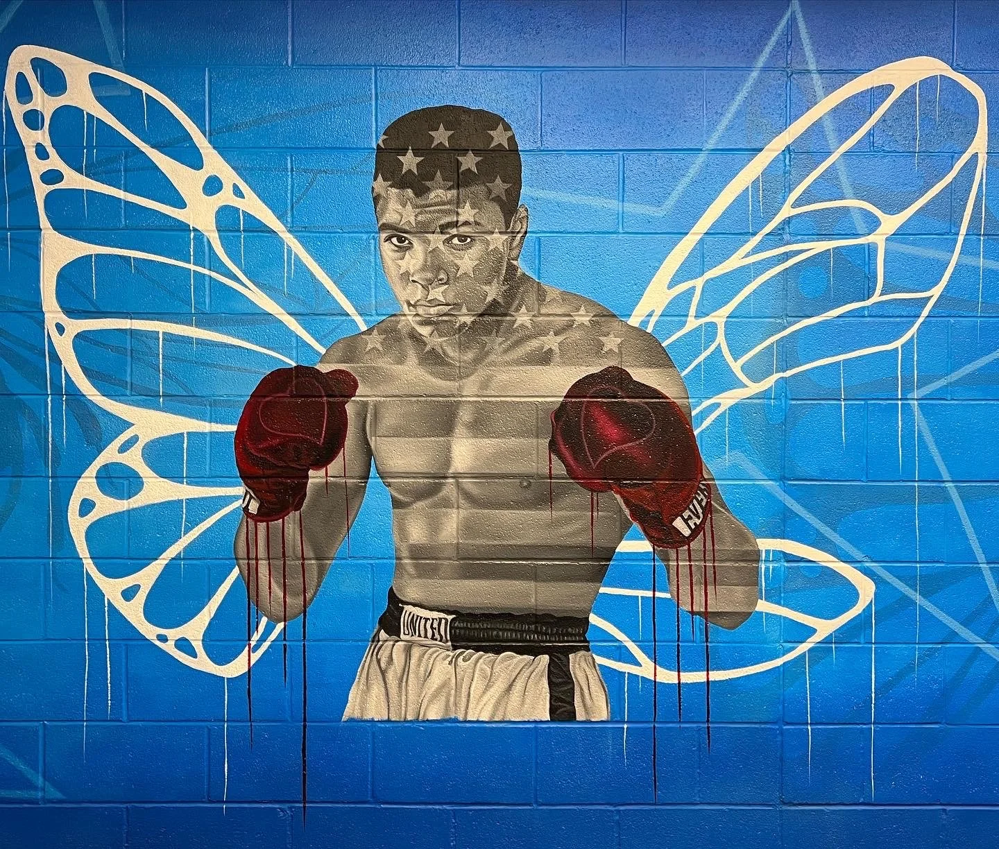 Interior mural commissioned by the LeBron James Family Foundation for House Three Thirty. The portrait of Muhammad Ali was created using acrylic and oil paint, honoring legacy, resilience and cultural impact.