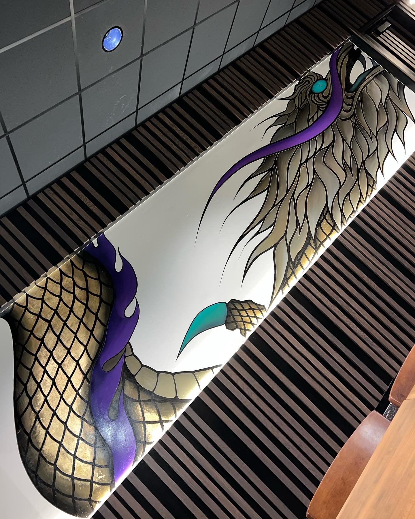 Multi-Space Installation featuring custom murals, large-scale plexiglass artworks and resin-coated oil paintings. The project integrated spray paint, acrylic, oil, gold leaf and resin across dining bars, private spaces and restrooms.