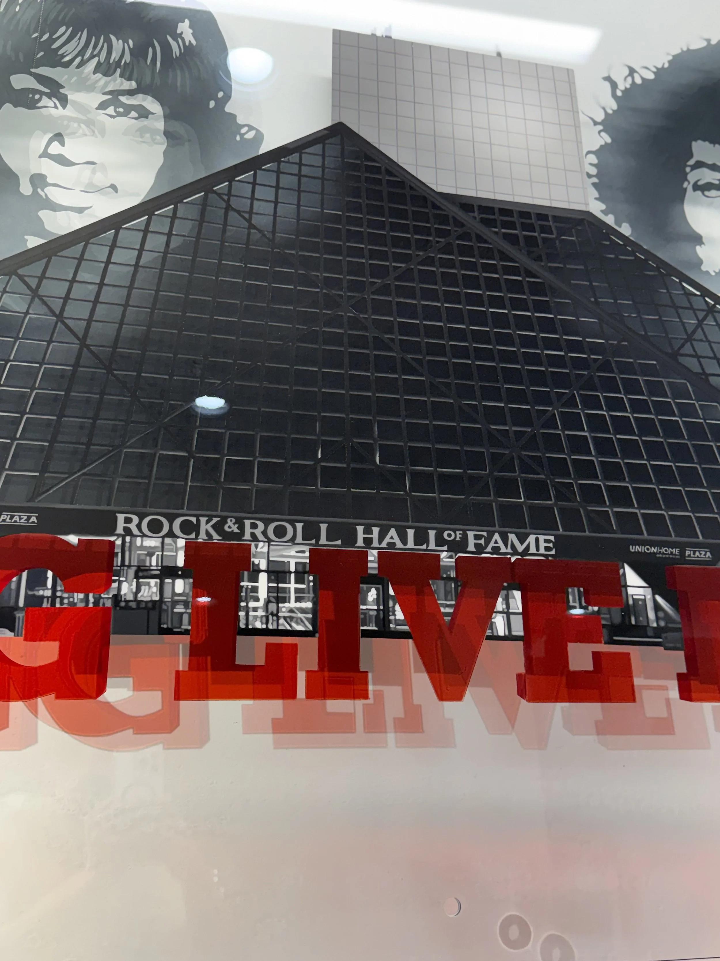 Rock & Roll Hall of Fame inspired glass installation created with oil paint, layered stained glass techniques and epoxy resin on 4ft x 6ft tempered glass. Installed using floating stainless steel standoffs. Over 200 hours in creation.