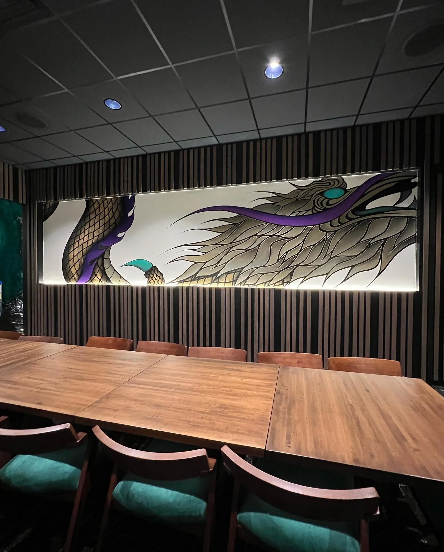 Multi-Space Installation featuring custom murals, large-scale plexiglass artworks and resin-coated oil paintings. The project integrated spray paint, acrylic, oil, gold leaf and resin across dining bars, private spaces and restrooms.