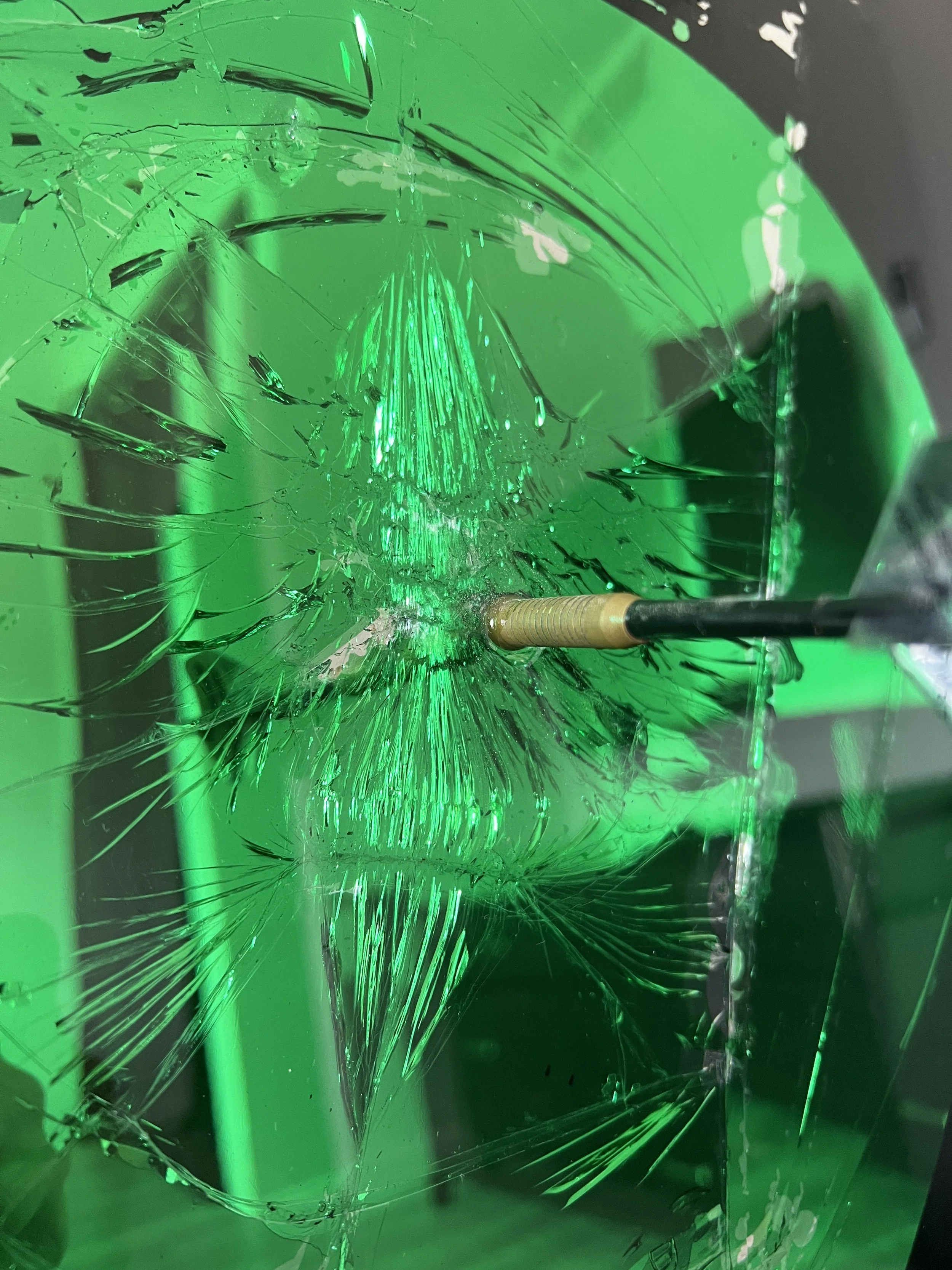 Stained glass paint, spray paint, acrylic, epoxy resin and a real playing dart on intentionally-shattered mirror. Mounted to canvas. 24 x 36 in.