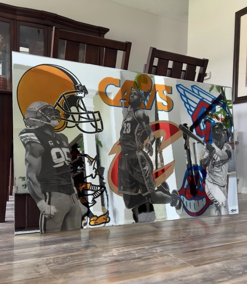 Custom mixed-media mirror artwork created for a private collector. The piece features graphite realism drawings, stained-glass painted mirror elements and epoxy resin on a 3ft x 5ft mirror.