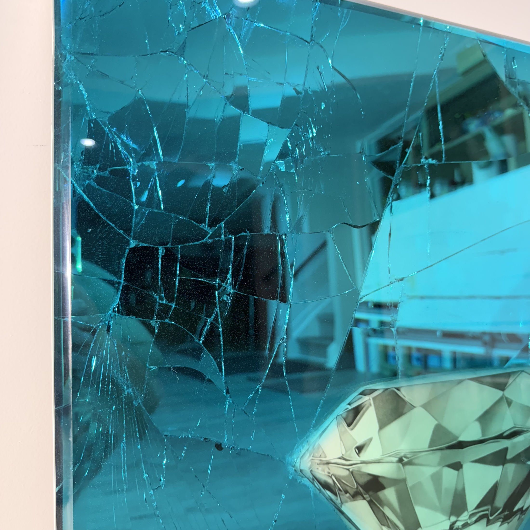 Graphite pencil drawing layered over intentionally shattered mirror and sealed with blue-dyed epoxy resin. Mounted to canvas. 24 x 30 in.