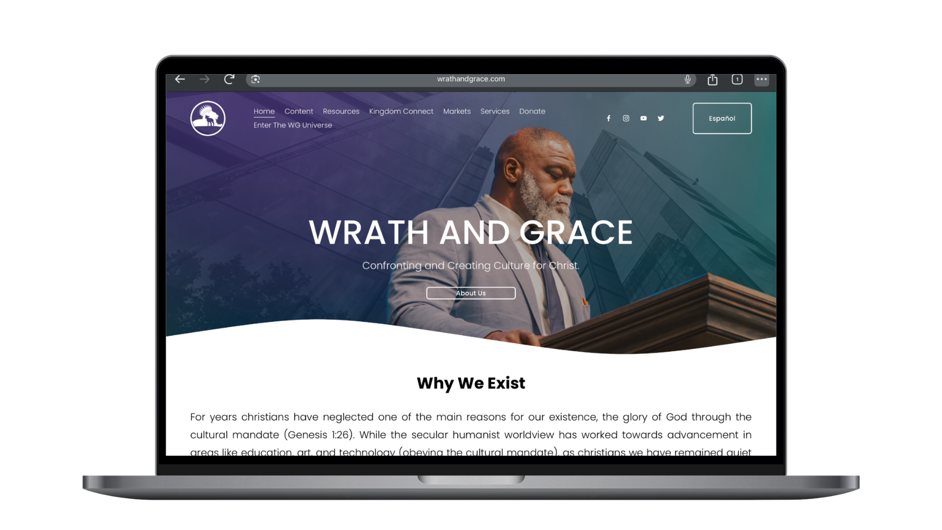 A laptop screen displaying a website titled 'Wrath and Grace,' featuring a photo of an older man reading from a podium outside a modern glass building. The homepage includes navigation links, social media icons, and a button labeled 'About Us.'