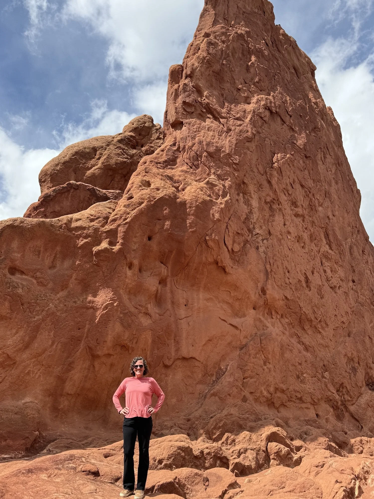 Kara standing in front of a rock in the Garden of the Gods