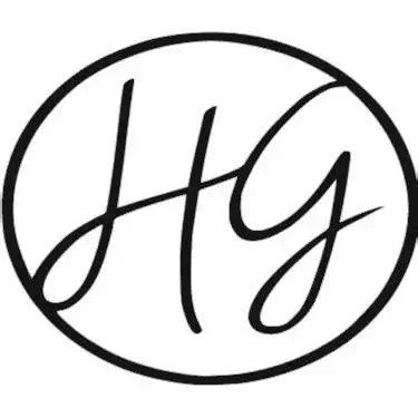 A black and white circular logo with the initials 'Hg' in a stylized script font.