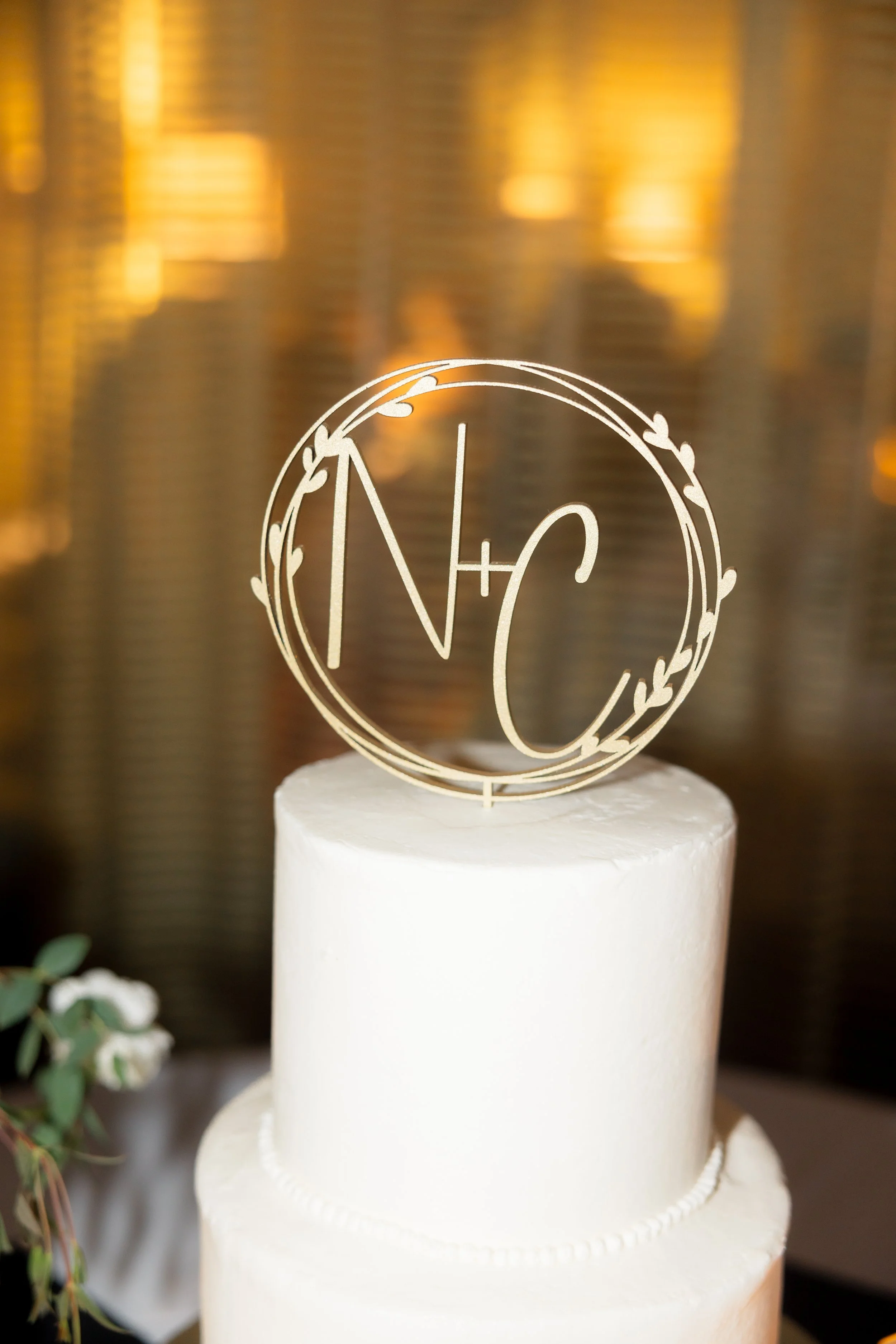 wedding cake with N + C on top
