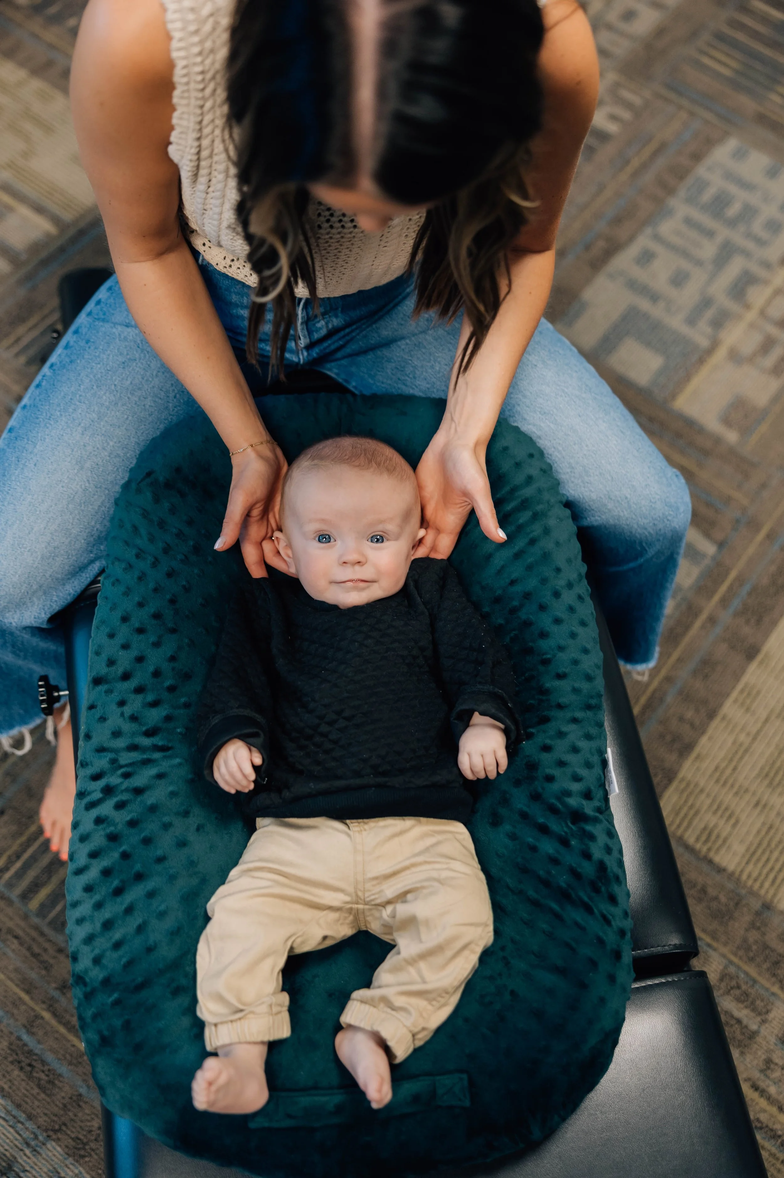 Dr. Emily Ramseth providing gentle pediatric chiropractic care in Vancouver, WA, supporting infant nervous system development and healthy growth.