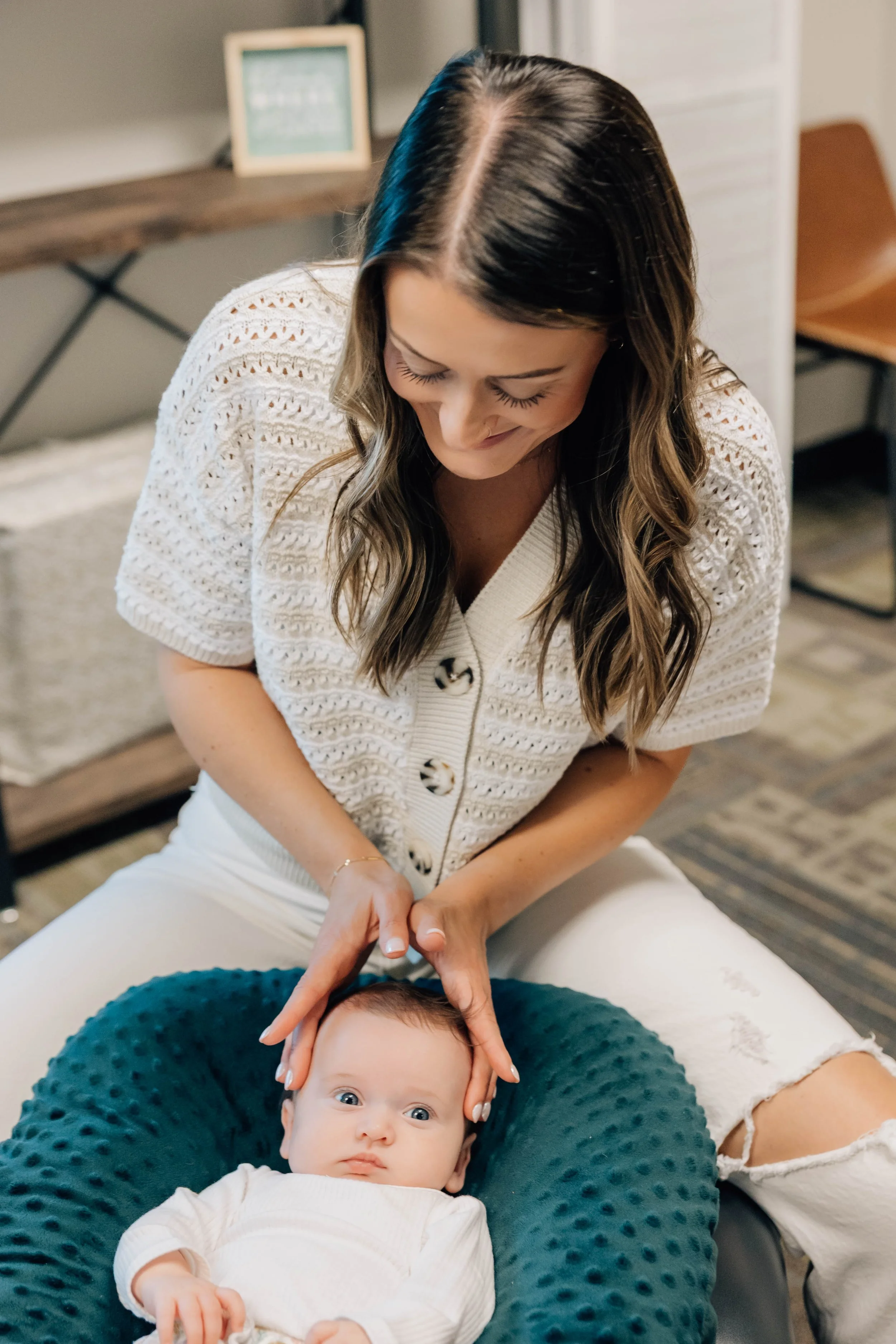 Dr. Emily Ramseth performing pediatric chiropractic care in Vancouver, WA, focusing on nervous system health, improved behavior, and overall wellness.