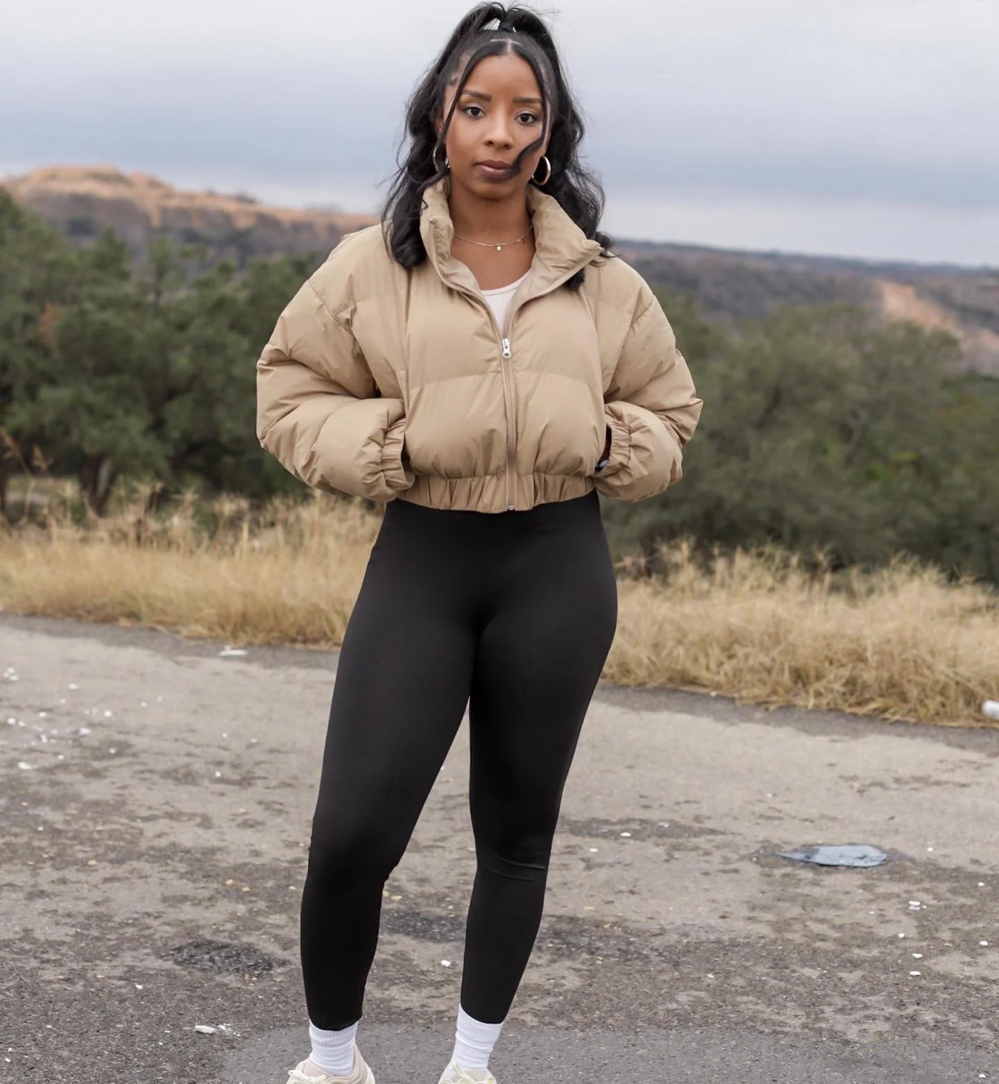 woman outside in beige puffer coat from shein