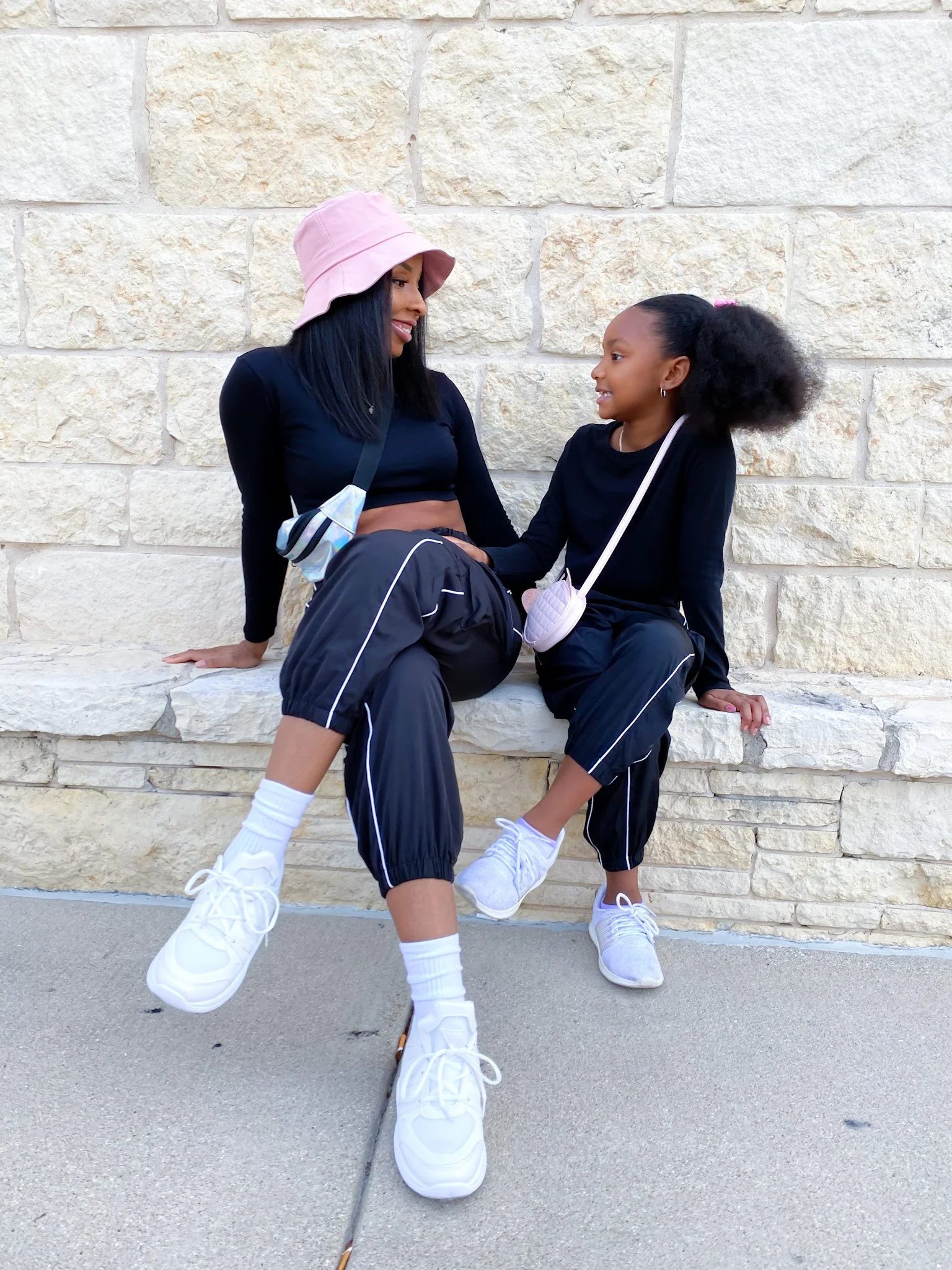 LaNese and Laila in Mommy and Me Matching Black Joggers from Shein