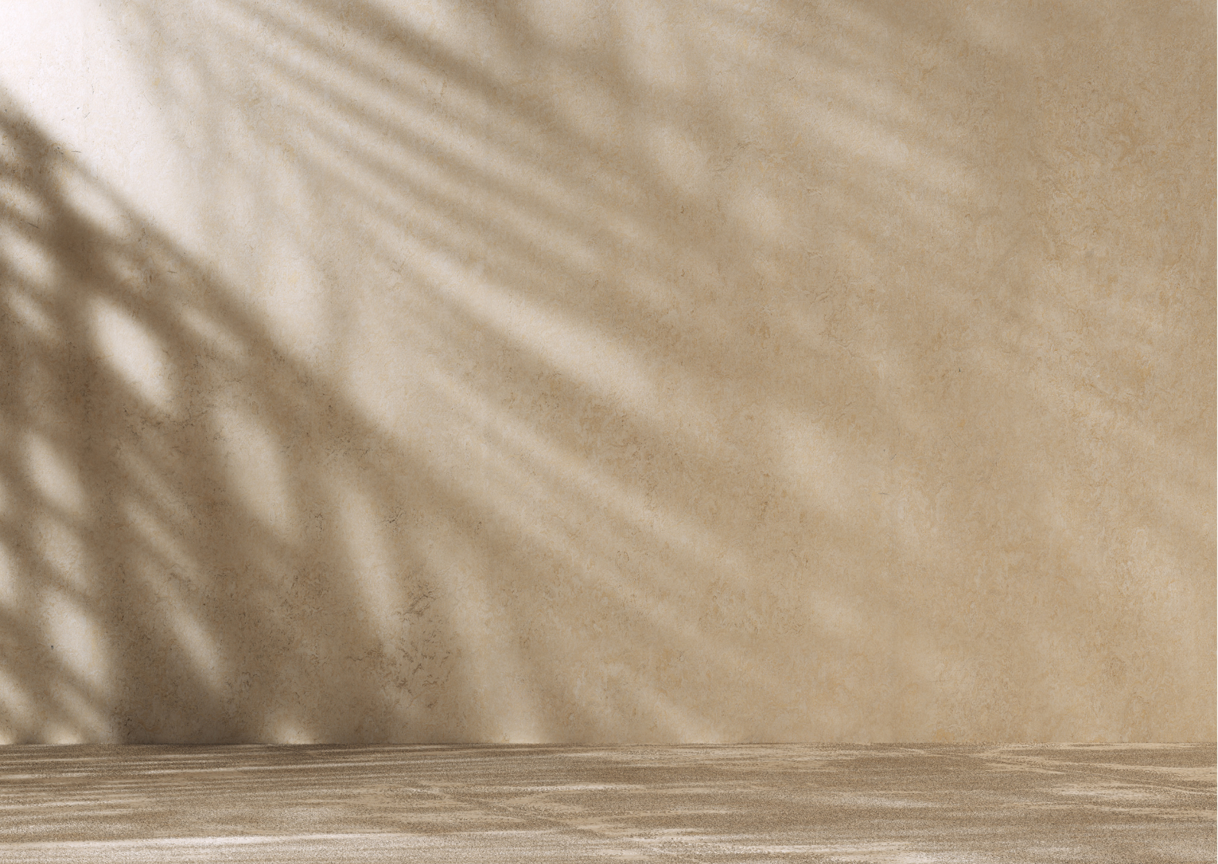 Sol en bois clair avec ombres de feuilles sur un mur beige.