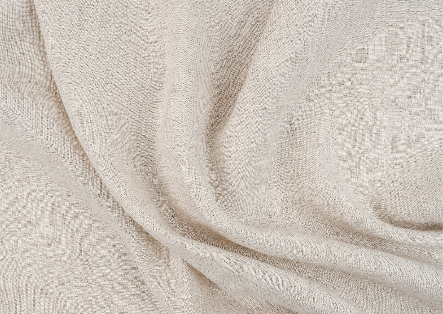 Tissu en lin de couleur beige avec des plis et une texture visible.